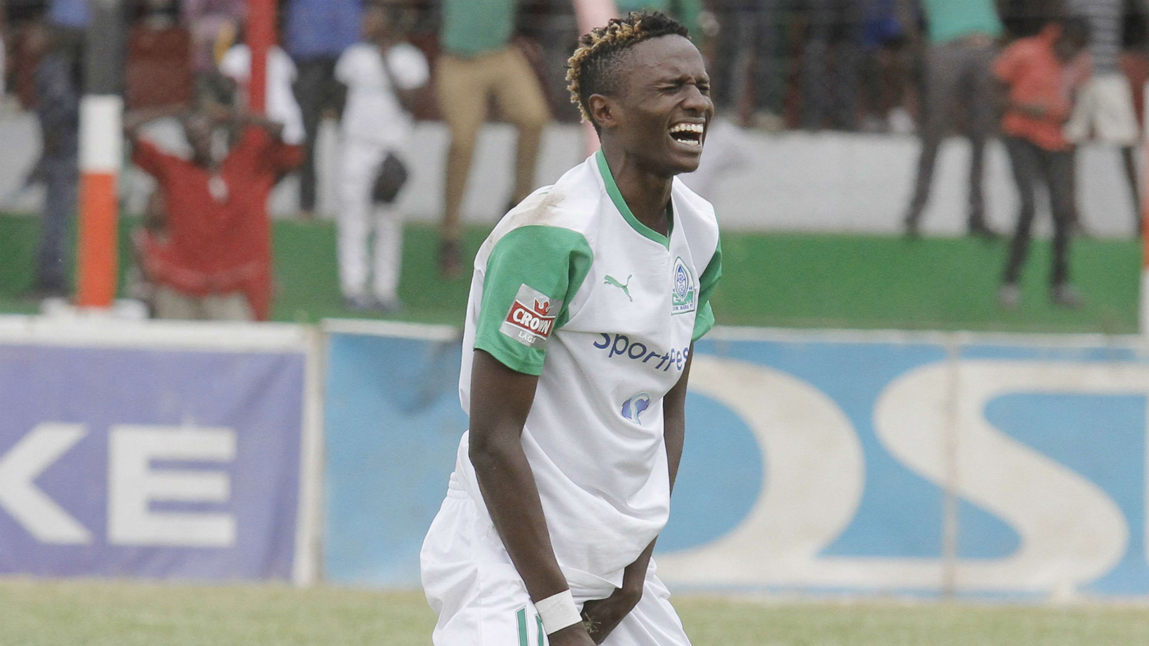 Gor Mahia new signing Kenneth Muguna reacts after a hard challenge from Tusker player.