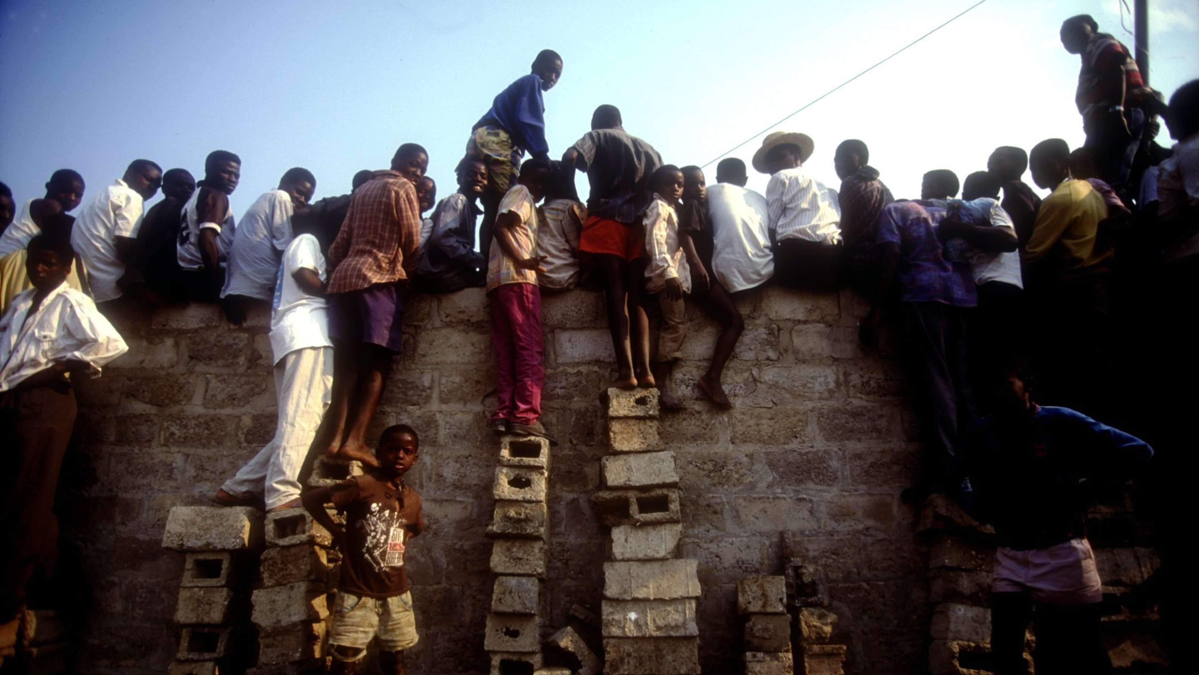 Fans watch the Zambian team play in 1993