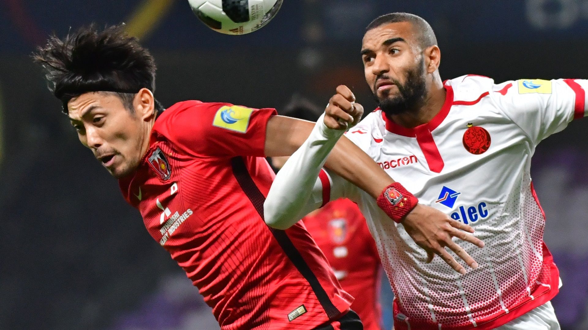 Ismail El Haddad of Wydad Casablanca and Ryota Moriwaki of Urawa Reds