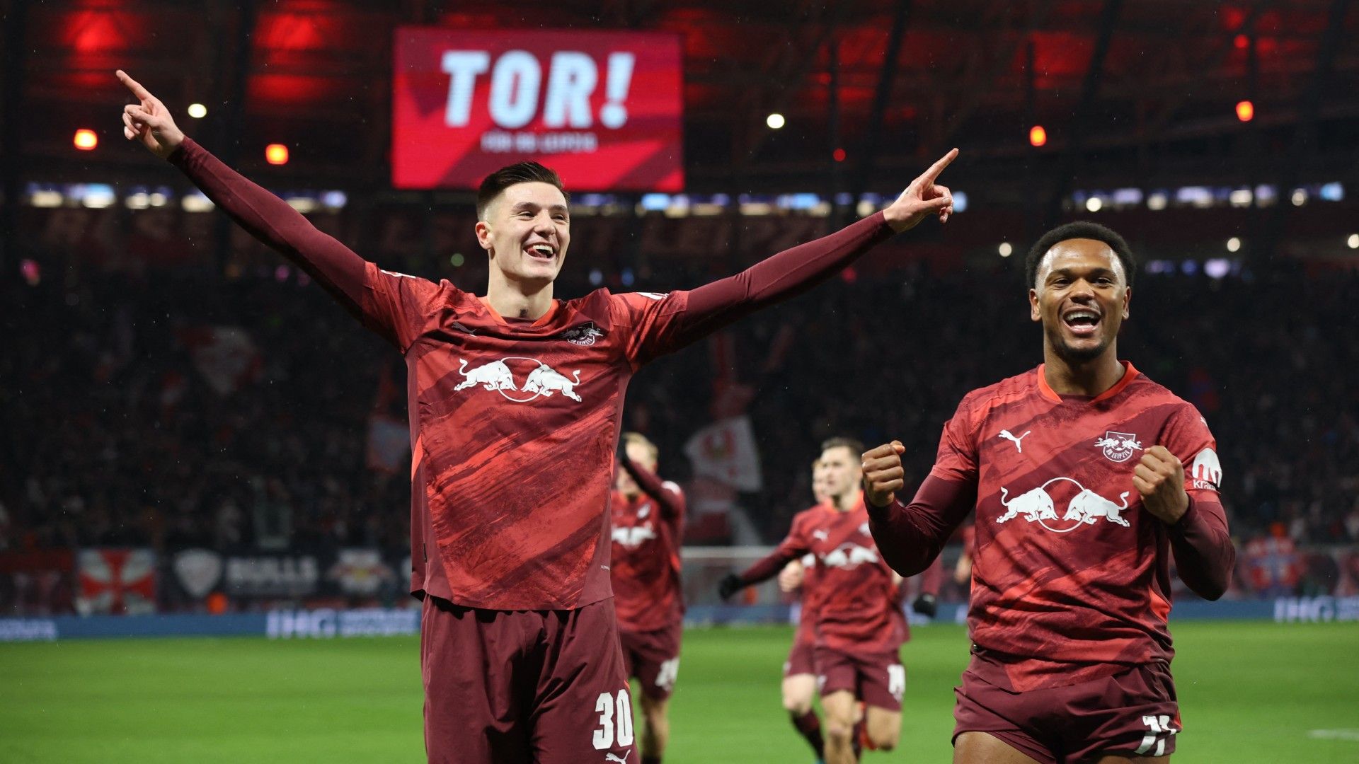 Leipzig's Slovenian forward #30 Benjamin Sesko celebrates