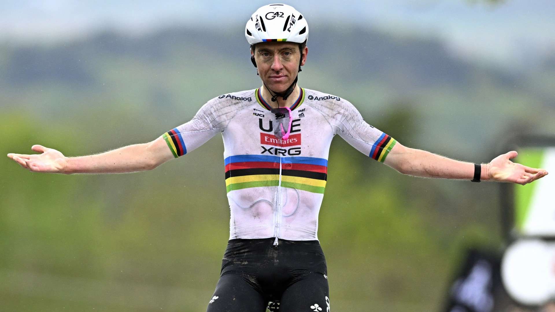 UAE Team Emirates' Slovenian rider Tadej Pogacar celebrates