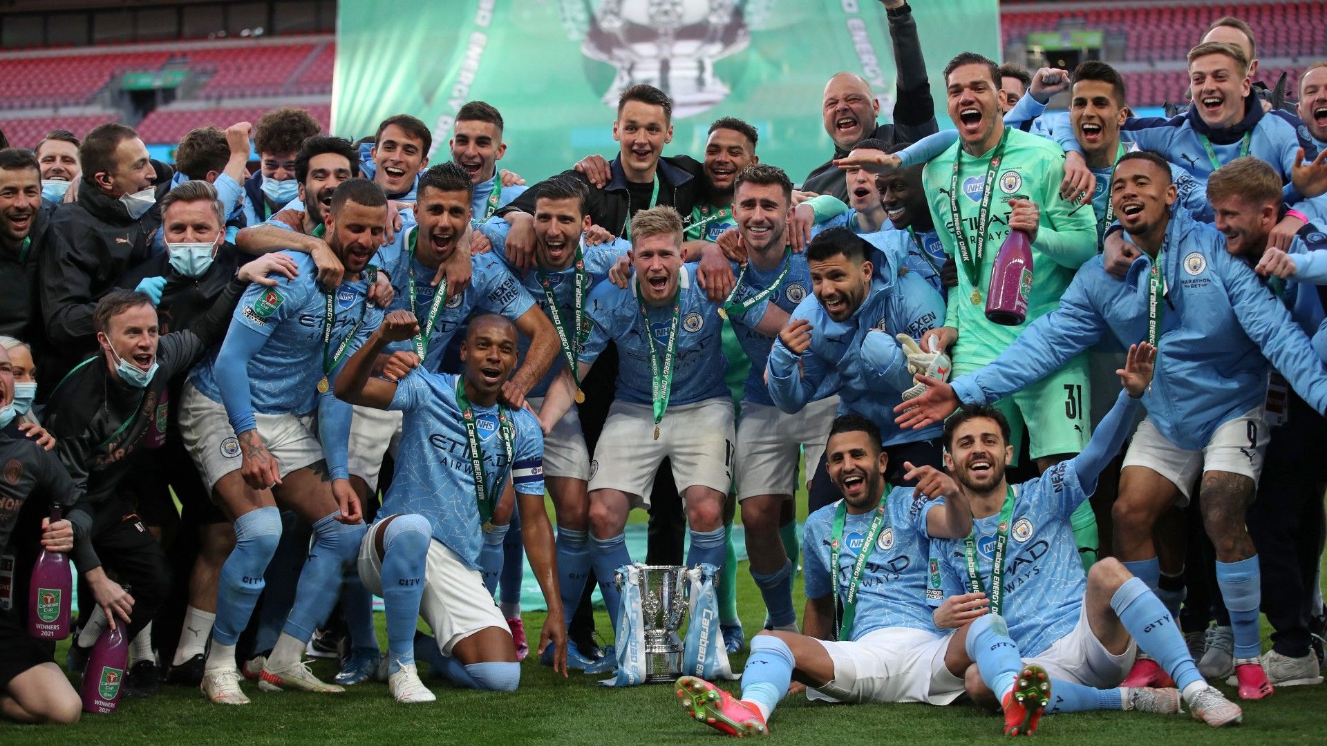 Man City team celebrate Carabao Cup final vs Tottenham 2020-21
