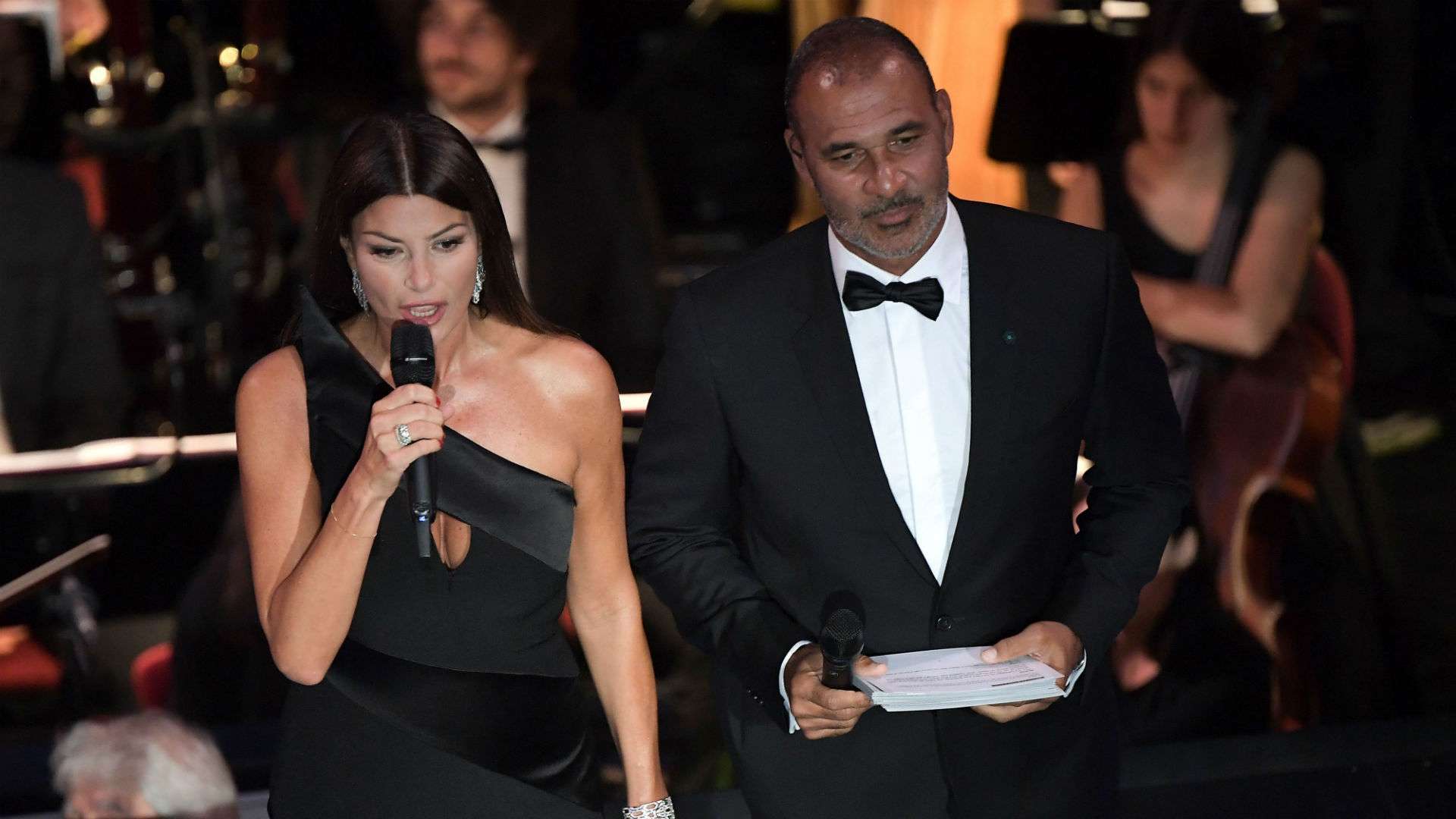 Ilaria D Amico and former Dutch footballer Ruud Gullit speak during The Best FIFA Football Awards ceremony