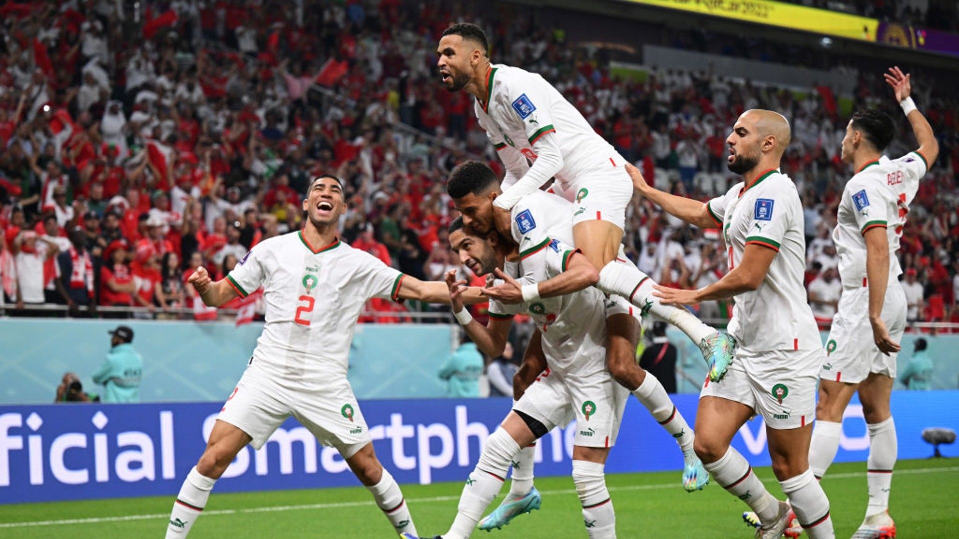 Morocco players celebrate against Canada.