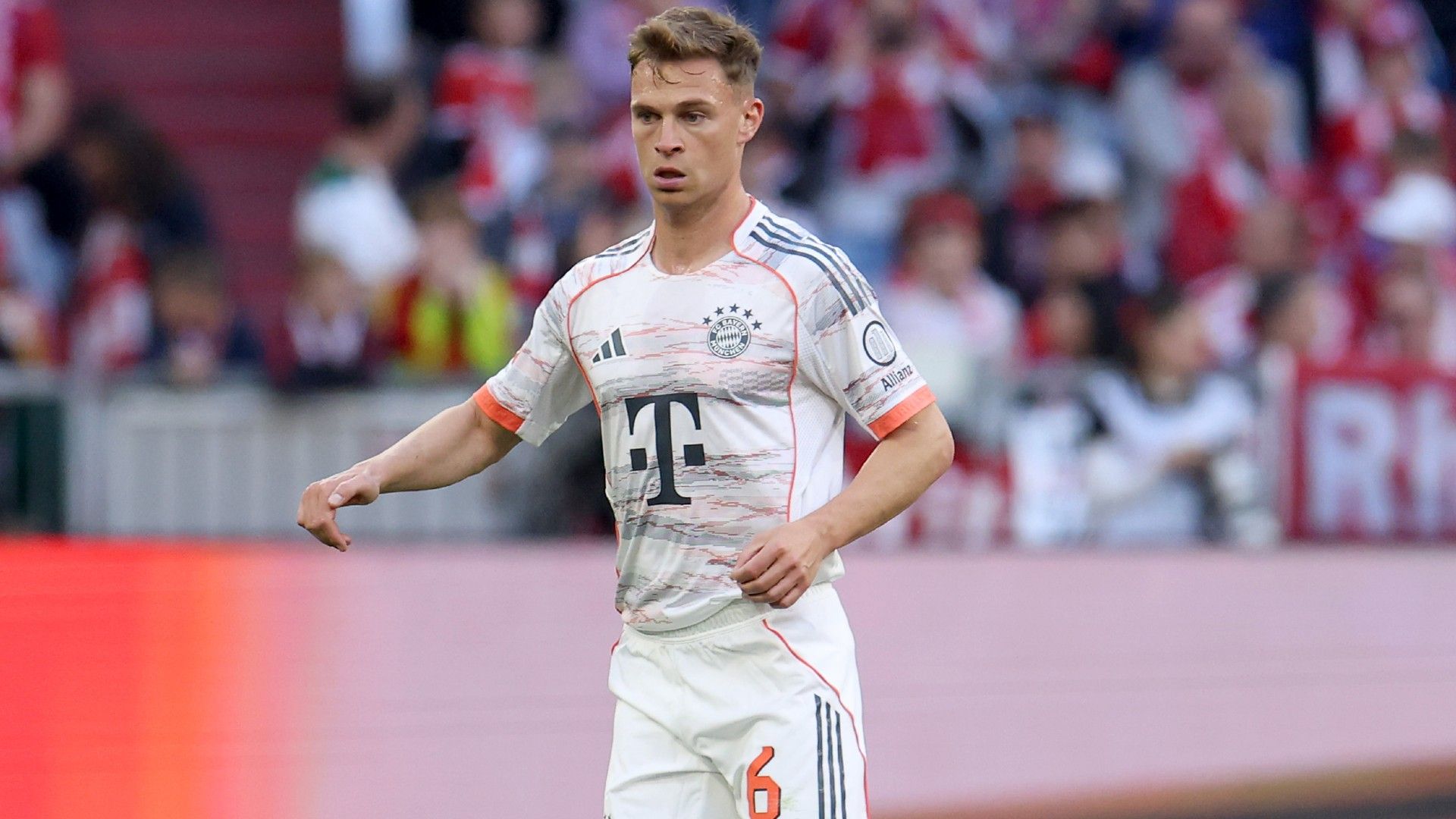 Joshua Kimmich of FC Bayern München runs with the ball 