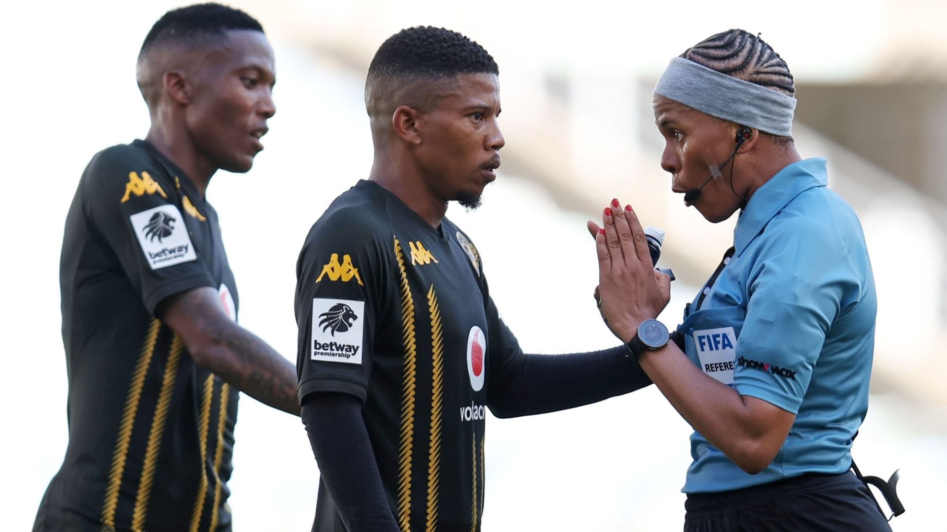 Tebogo Potsane, Pule Mmodi of Kaizer Chiefs with Referee Akhona Makalima