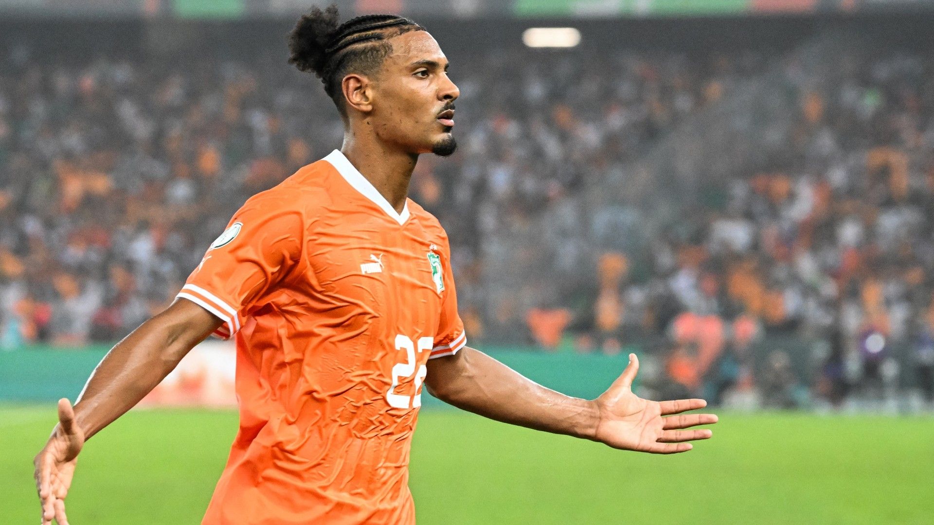 Ivory Coast's forward #22 Sebastien Haller celebrates
