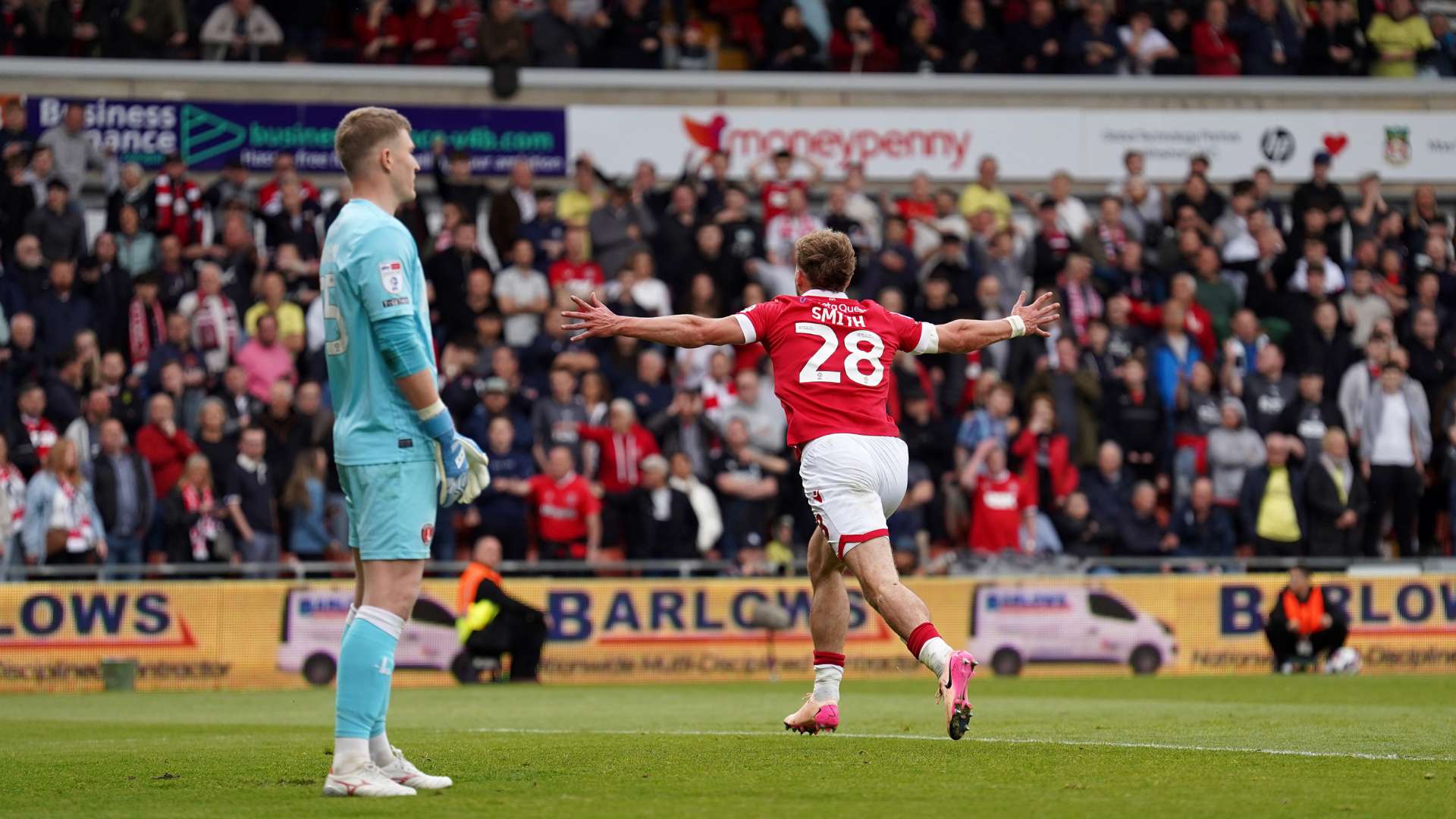 Sam Smith of Wrexham celebrates scoring his team's second goal