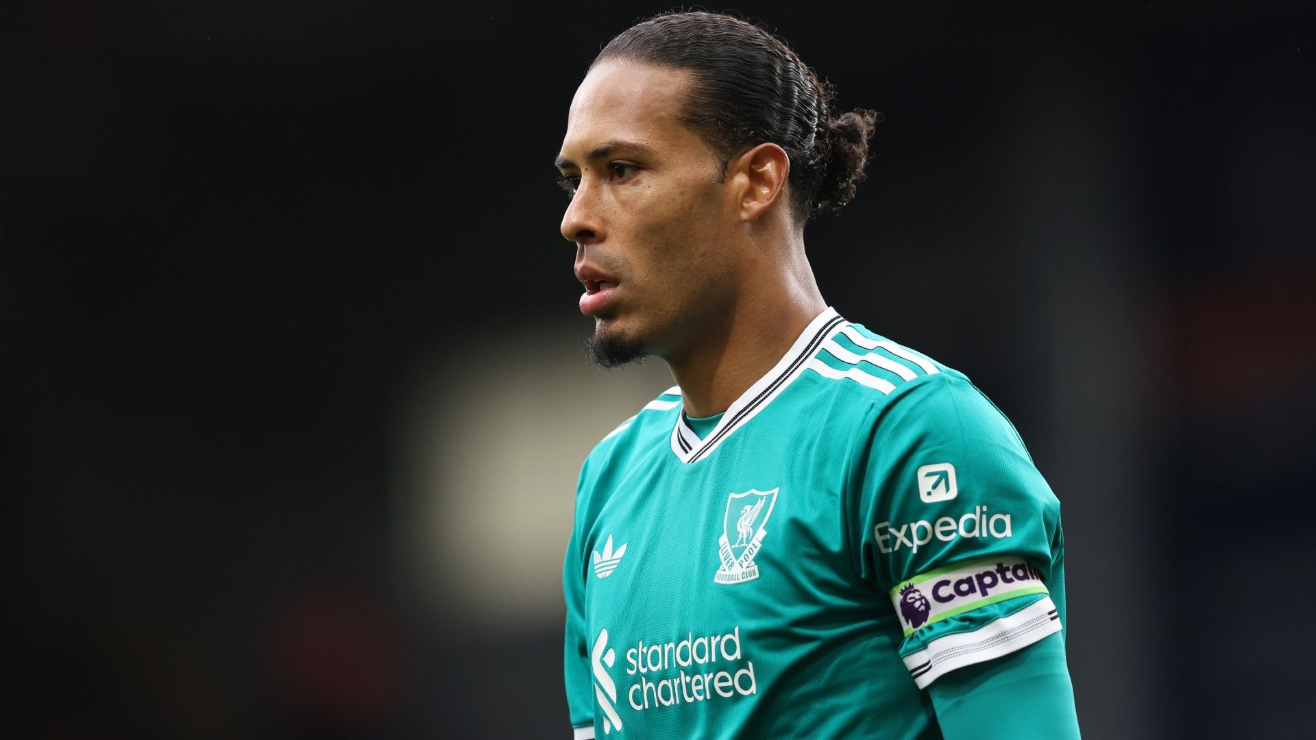 Virgil van Dijk of Liverpool looks on