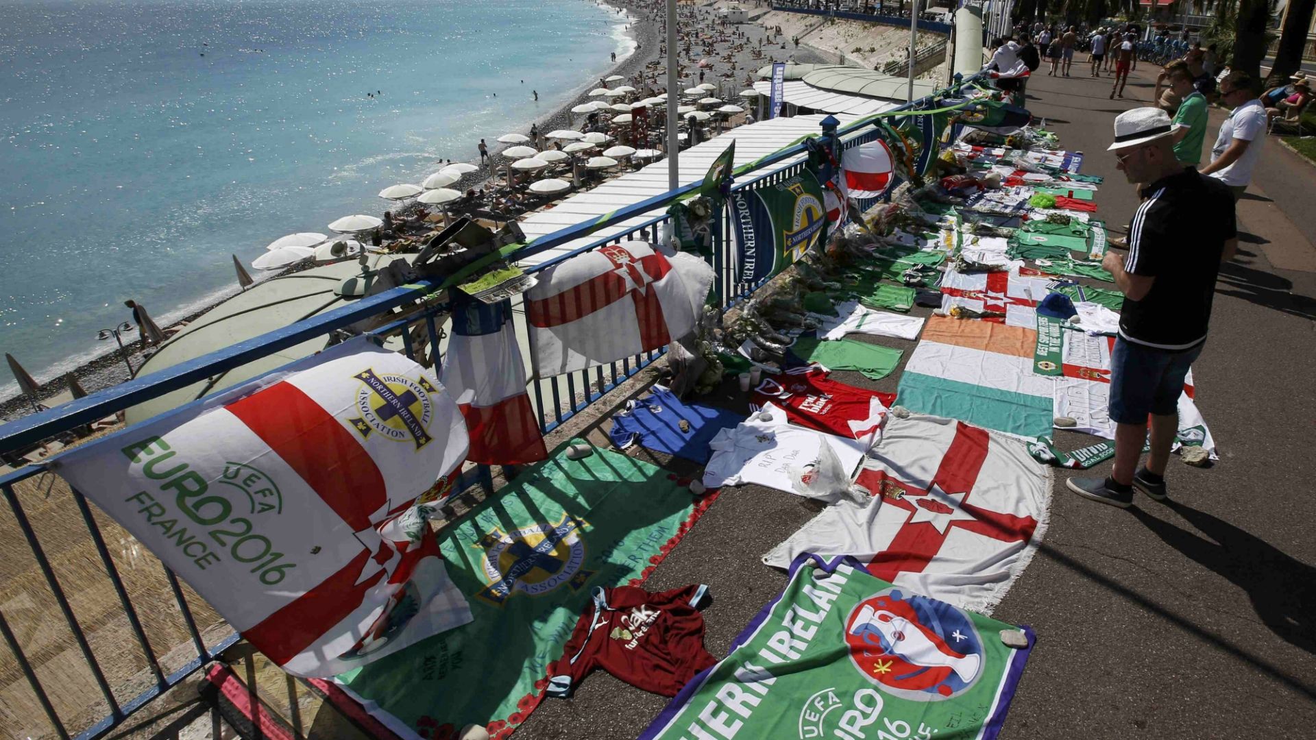 A man pays tribute to a Northern Ireland soccer fan who died accidentally in Nice