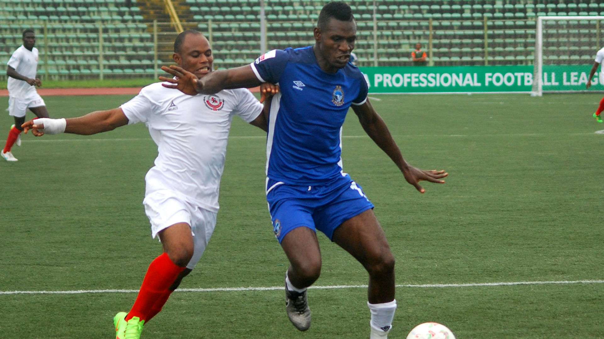 Kelly Kester,Enyimba in blue v Ocheme Udoh, Enugu Rangers.jpg