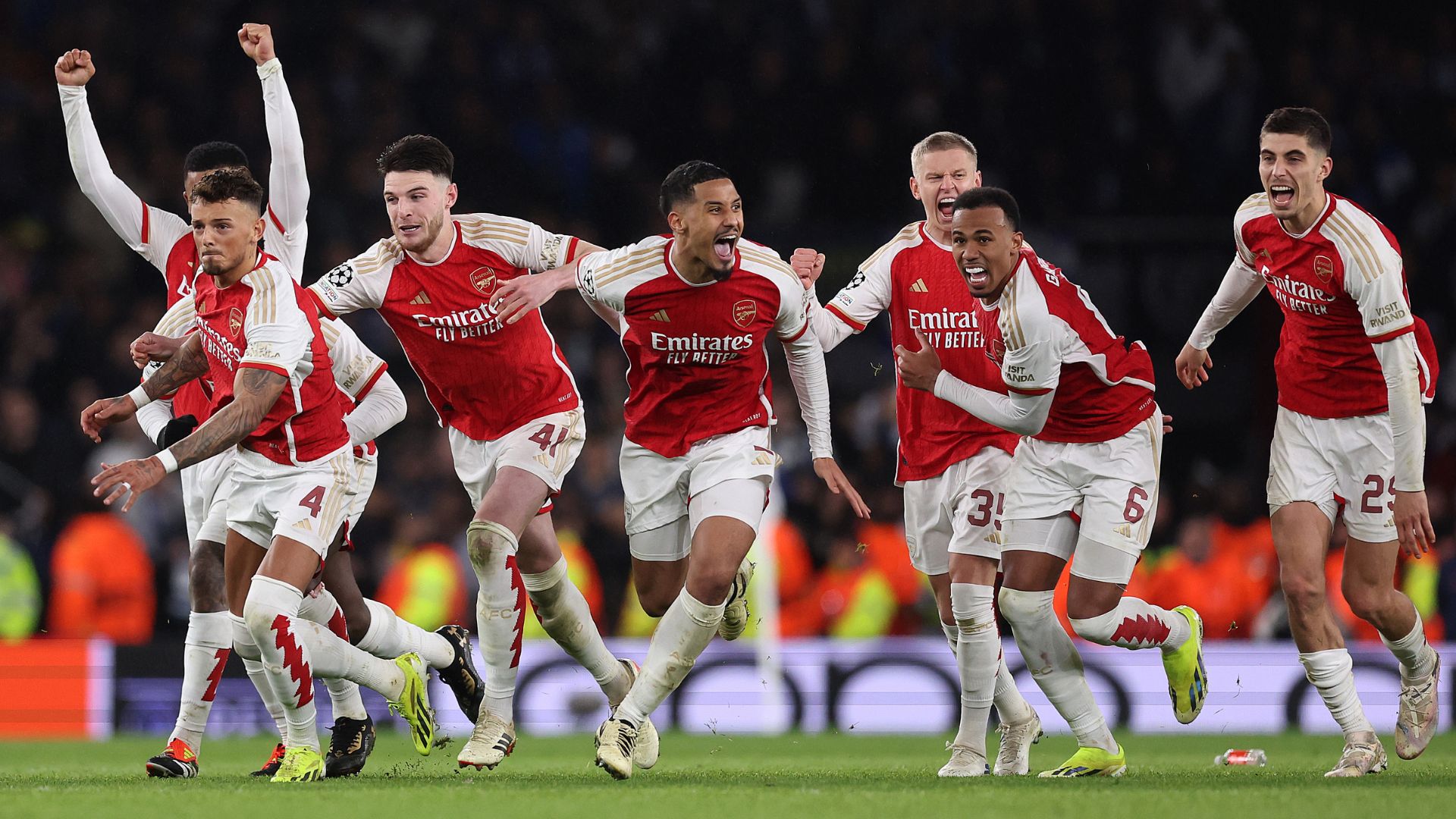 Arsenal celebrate as David Raya of Arsenal (not pictured) makes the match-winning save