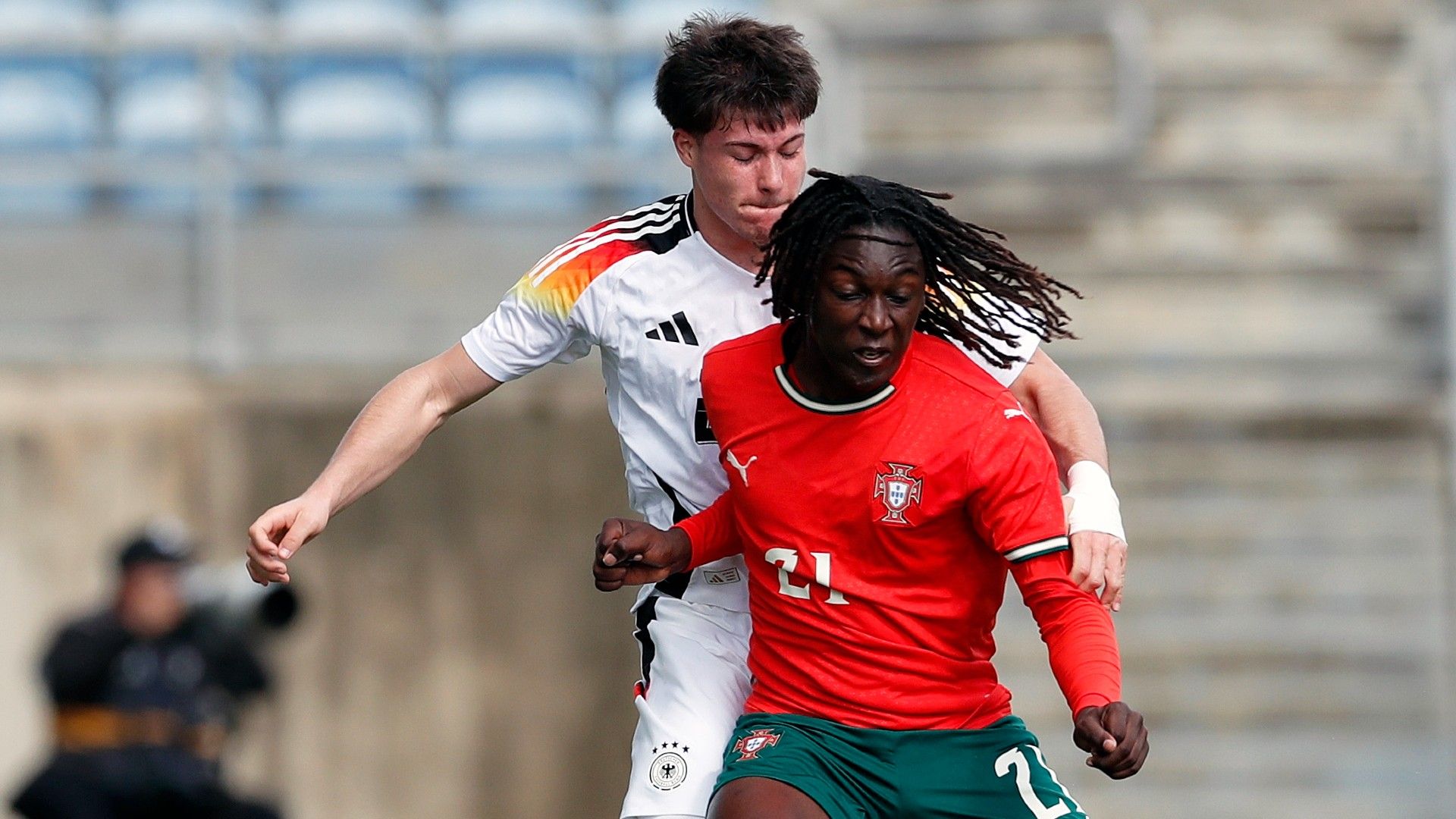 Dustin Buck (L) of U17 Germany challenges Stevan Manuel (R) of U17 Portugal