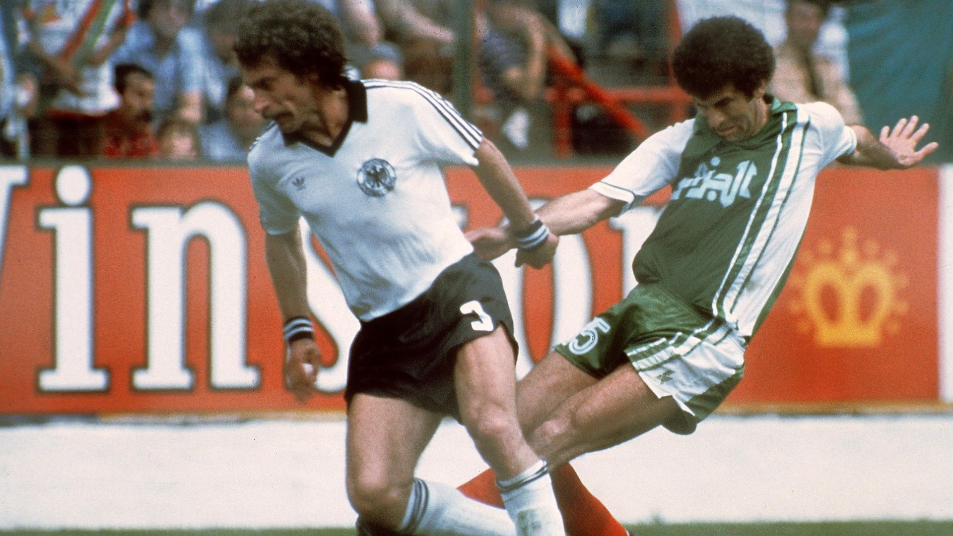 Paul Breitner of Germany, Mustapha Dahleb of Algeria