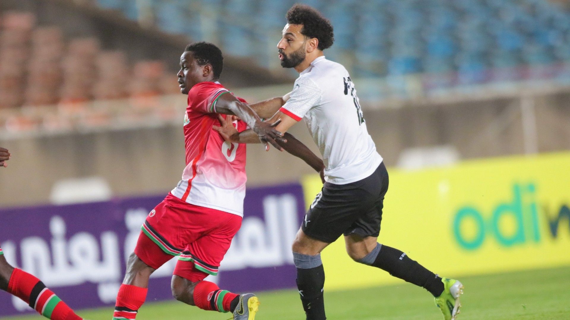 Eric Ouma of Kenya and Harambee Stars vs Mohamed Salah of Egypt.