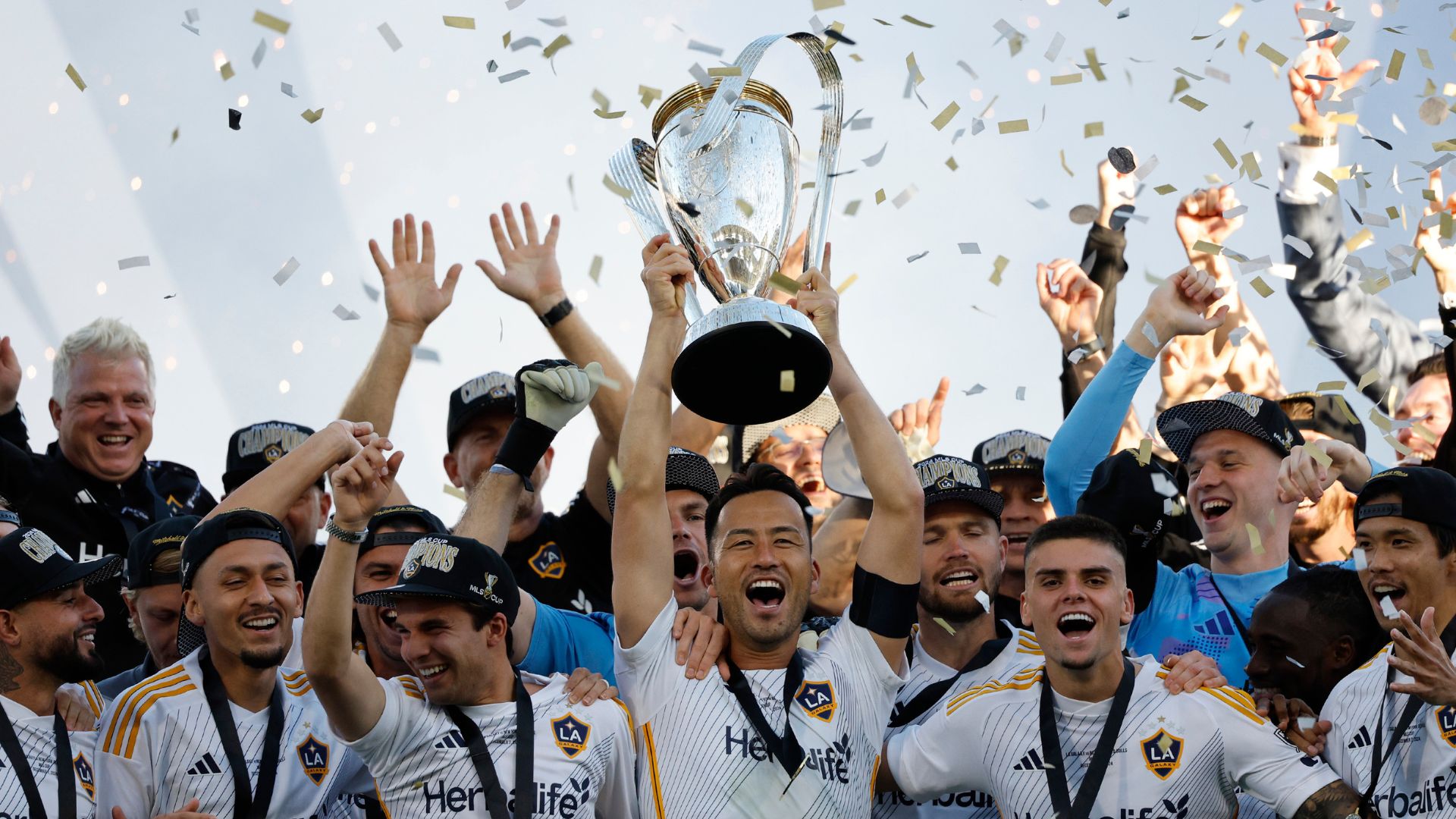Maya Yoshida #4 of Los Angeles Galaxy celebrate with the trophy after winning the 2024 MLS Cup Final