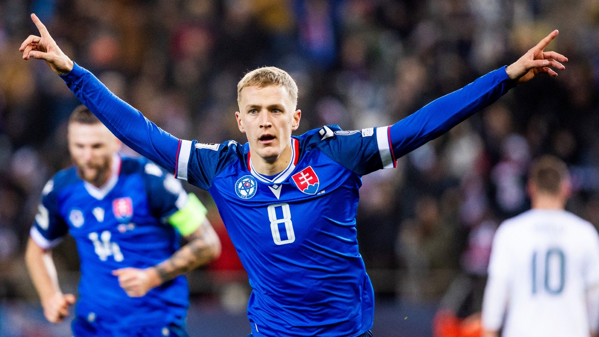 Slovakia's forward #08 Tomas Bobcek celebrates scoring