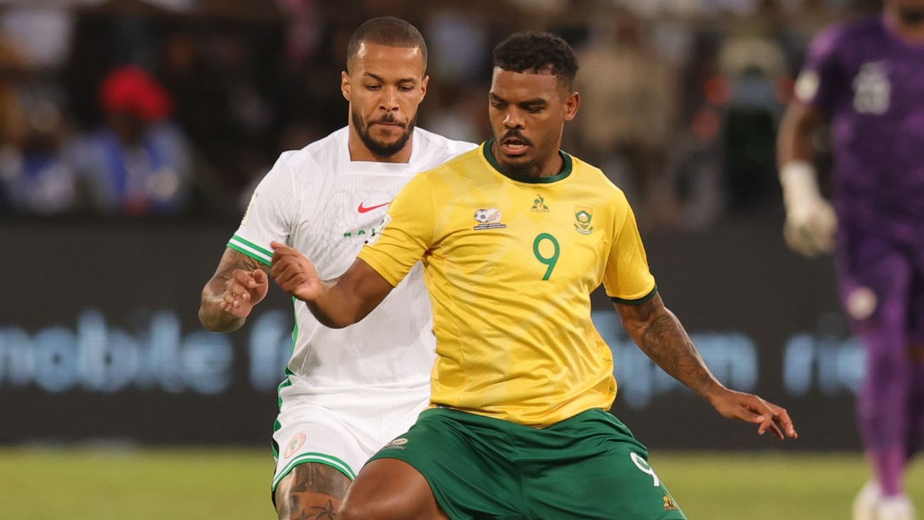 Lyle Foster of South Africa and William Troost-Ekong of Nigeria