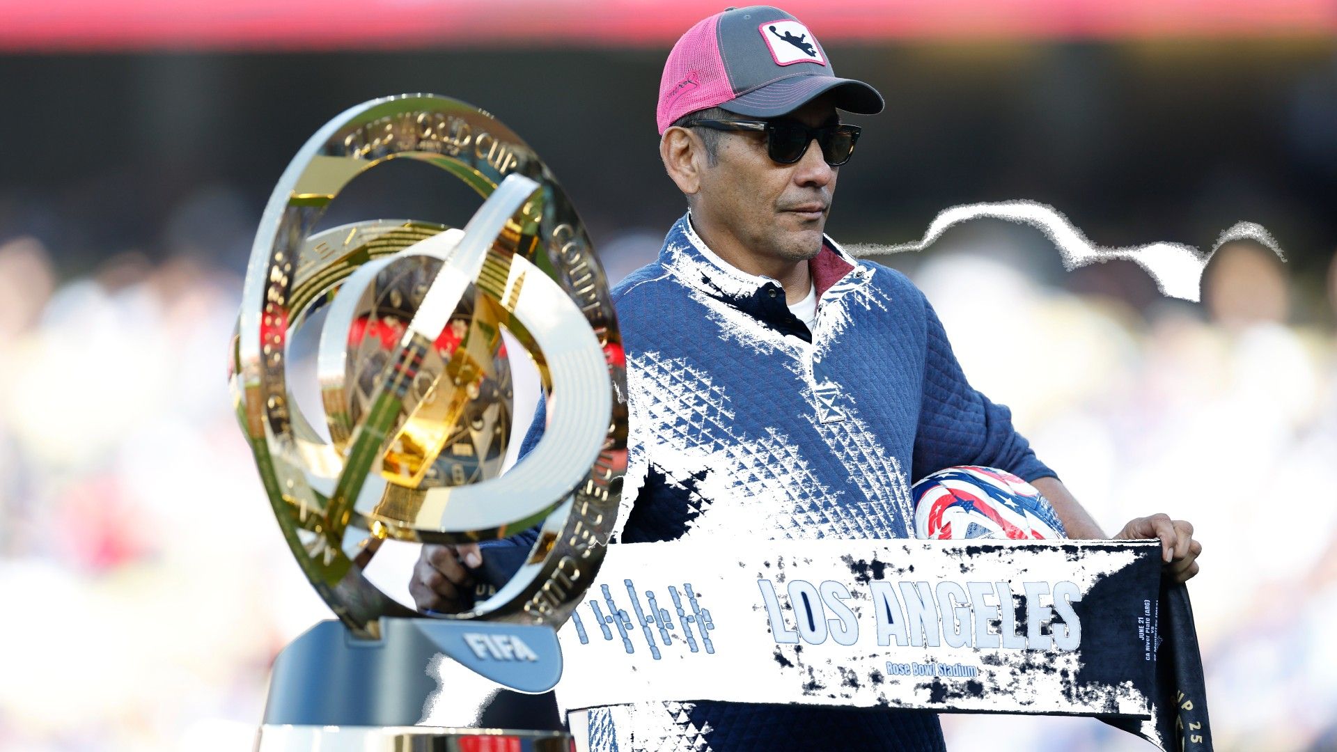 Former Mexico national football team player Jorge Campos poses with the FIFA Club World Cup 2025 trophy 