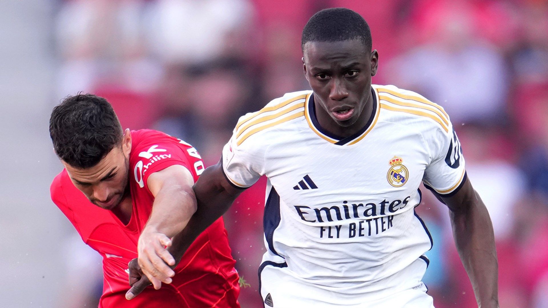 Real Madrid's Ferland Mendy battles for possession against Mallorca