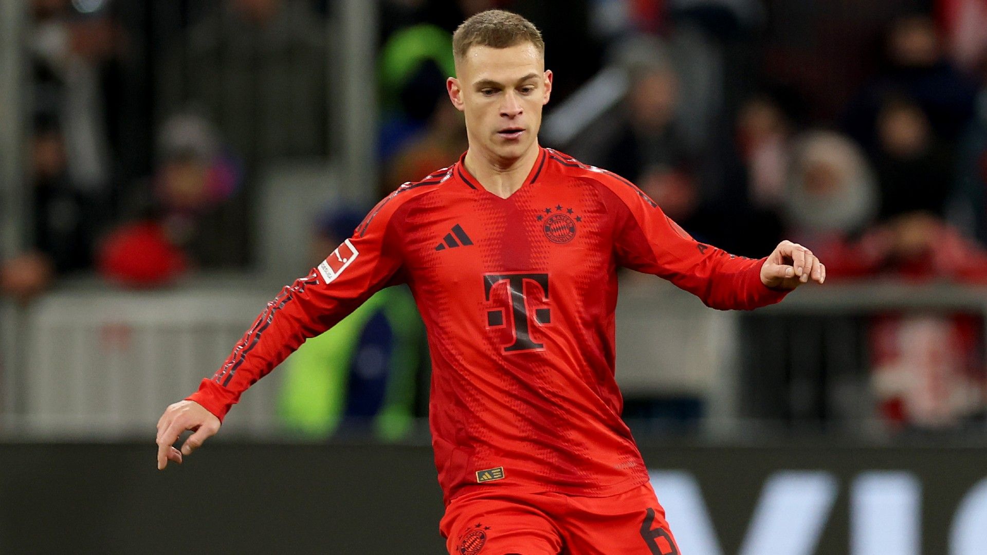  Joshua Kimmich of FC Bayern München runs with the ball