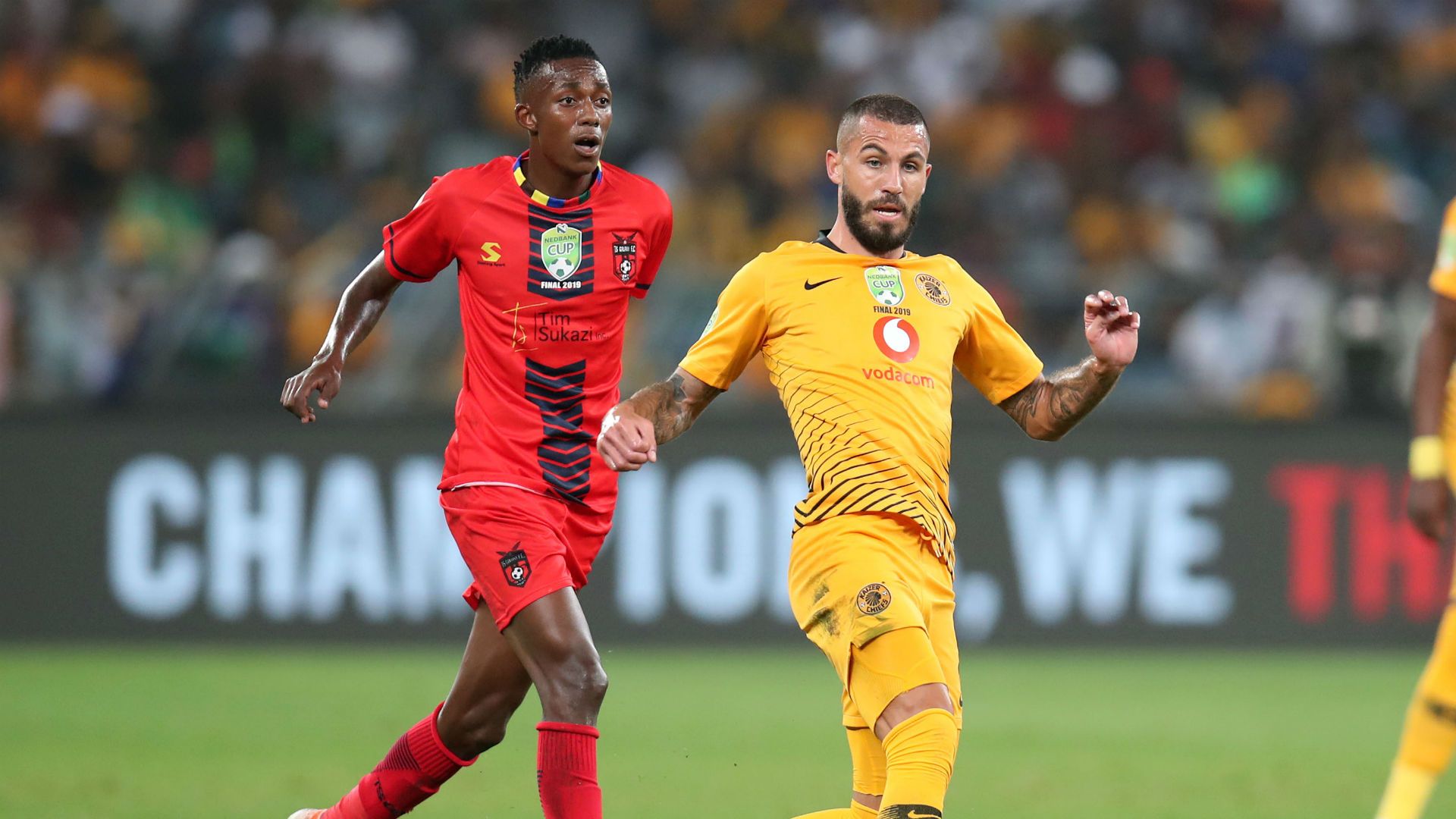Daniel Cardoso of Kaizer Chiefs challenged by Thembinkosi Mbamba of TS Galaxy, May 2019