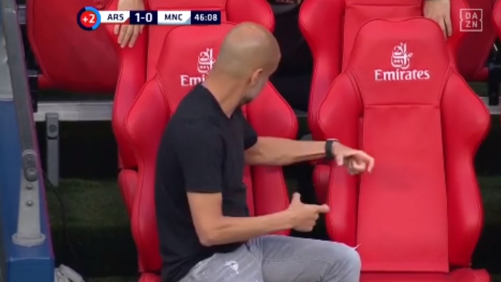 Pep Guardiola Manchester City talking to a chair