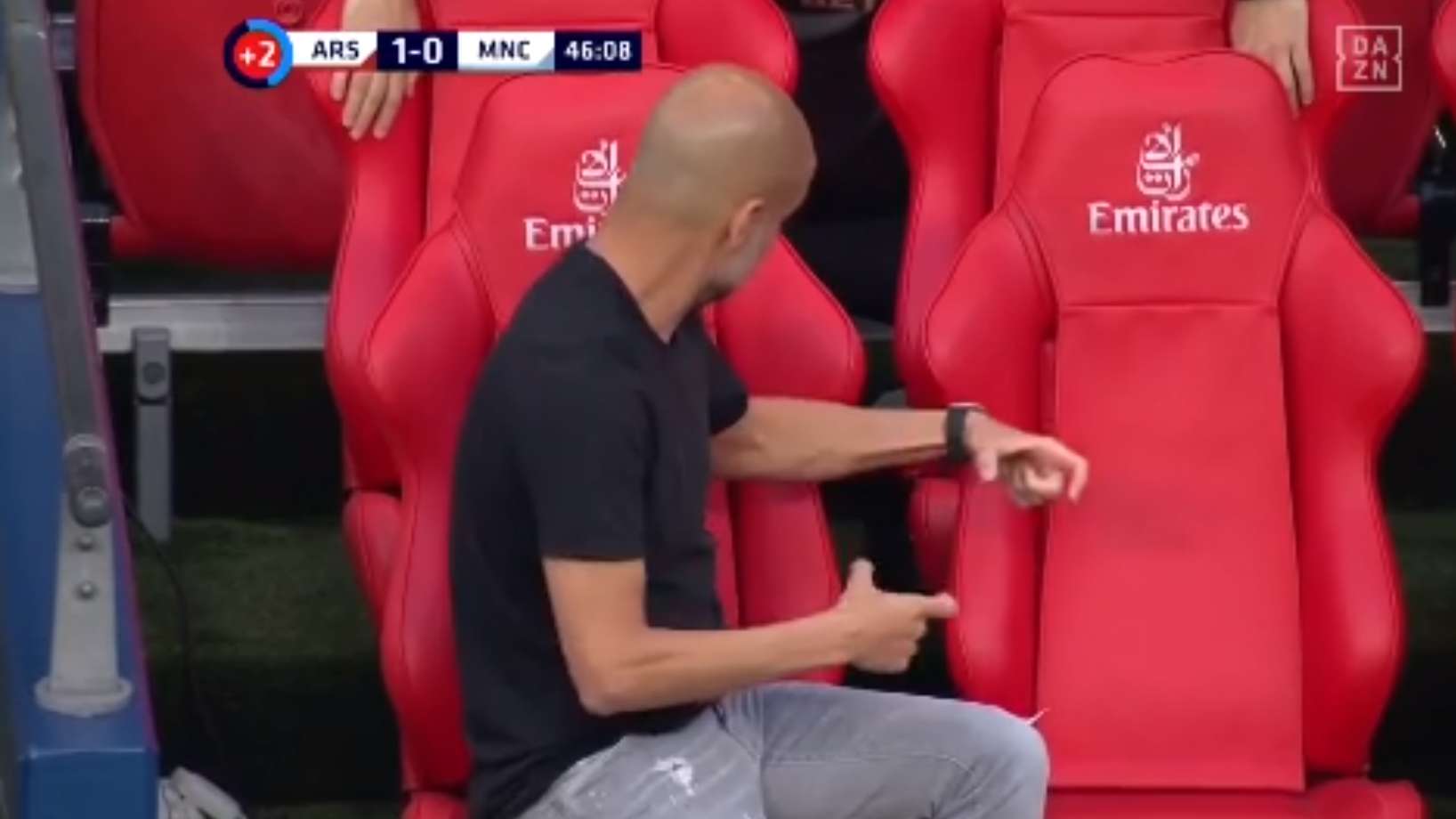Pep Guardiola Manchester City talking to a chair