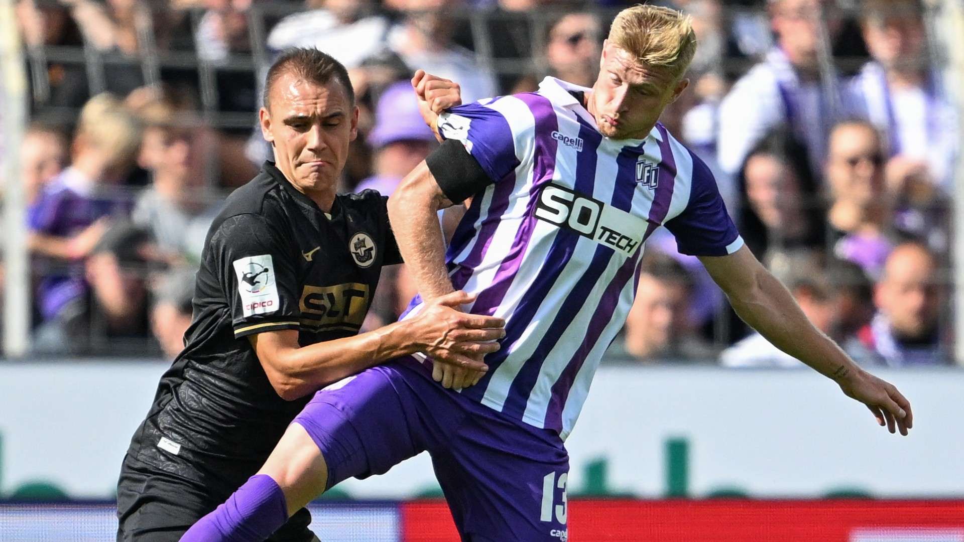 Kevin Schumacher of Osnabrueck and Franz Pfanne of Rostock