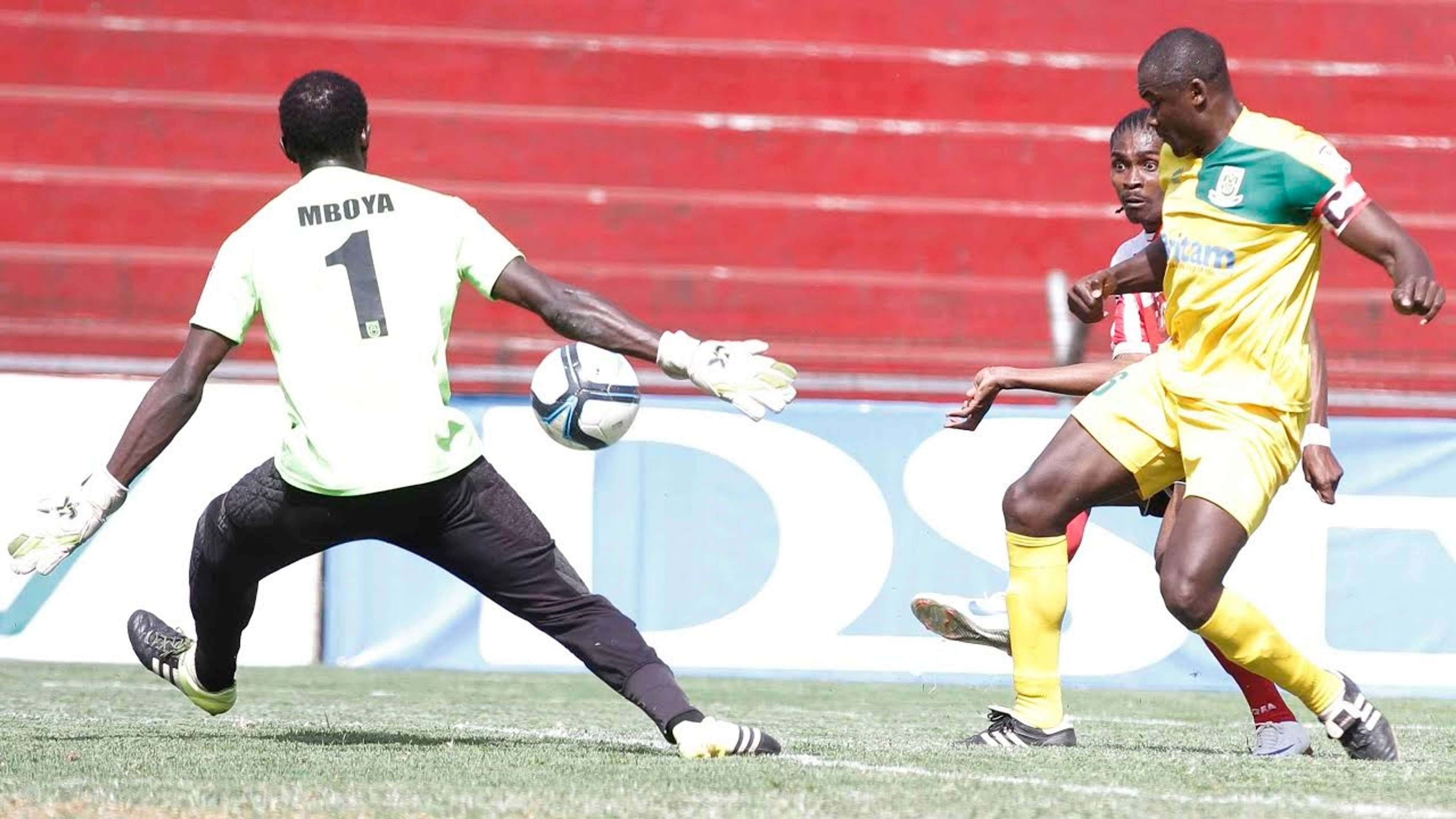 Roosevelt Blaty of Ushuru scores Mathare United keeper Robert Mboya