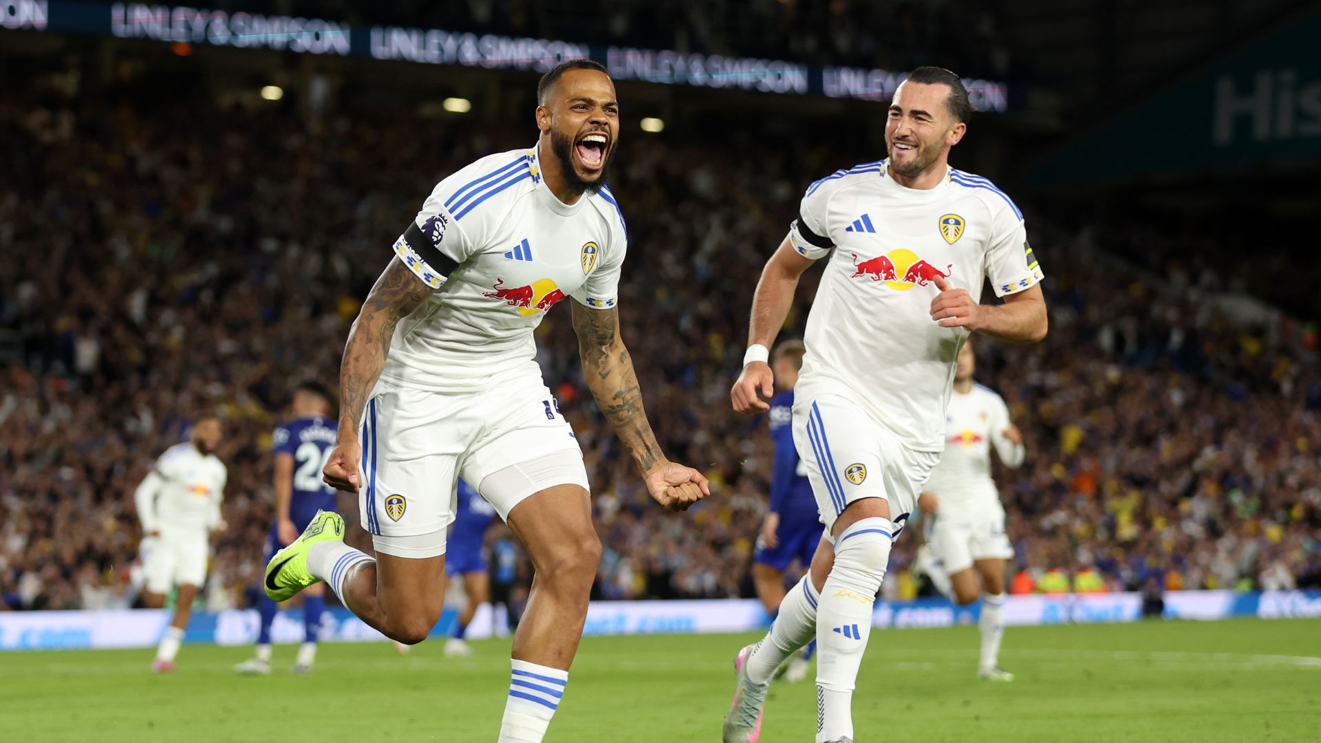 Lukas Nmecha of Leeds United celebrates scoring his team's first goal from a penalty