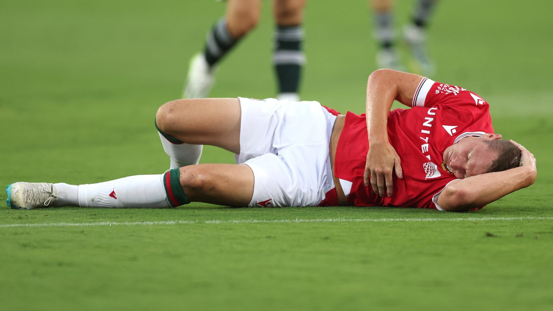 Paul Mullin Wrexham injury vs Manchester United pre-season 2023-24