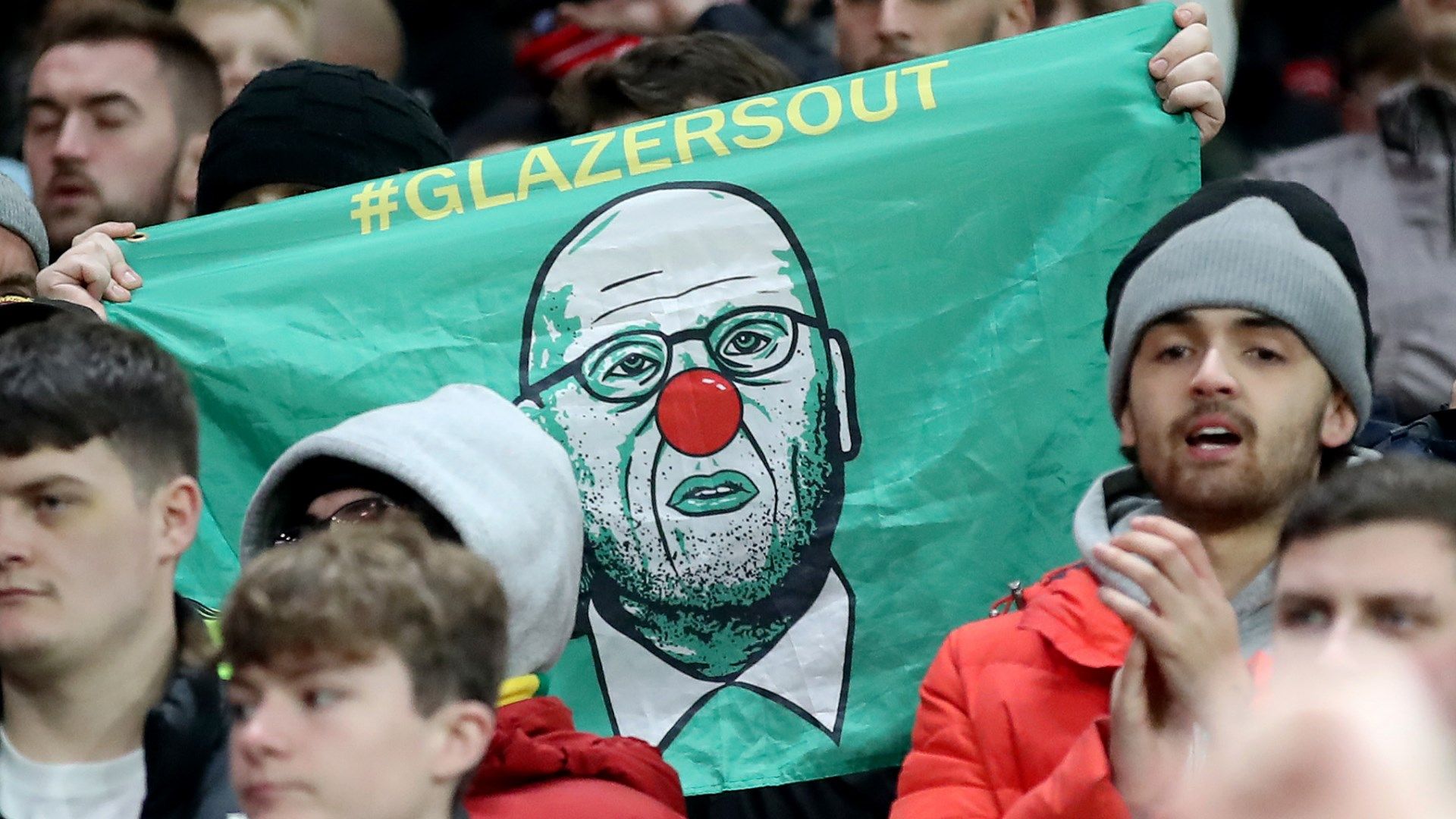 Glazer family protest clown