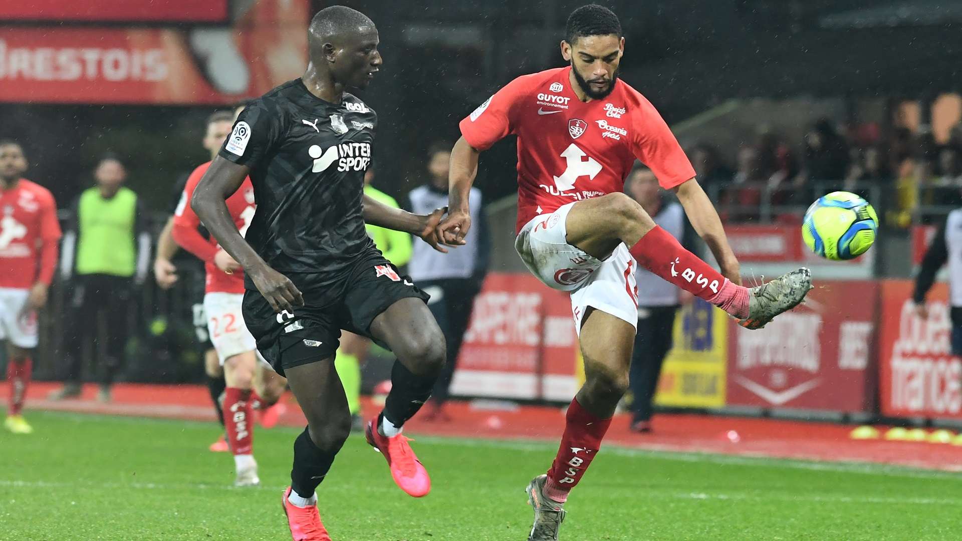 Brest's French-Cameroon defender Jean-Charles Castelletto vies with Amiens' forward Serhou Guirassy during the Ligue 1 encounter