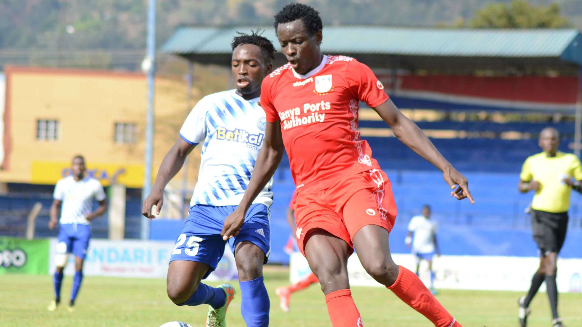 Sammy Imbuye (L) of Sofapaka FC tackles Brian Otieno of Bandari FC.