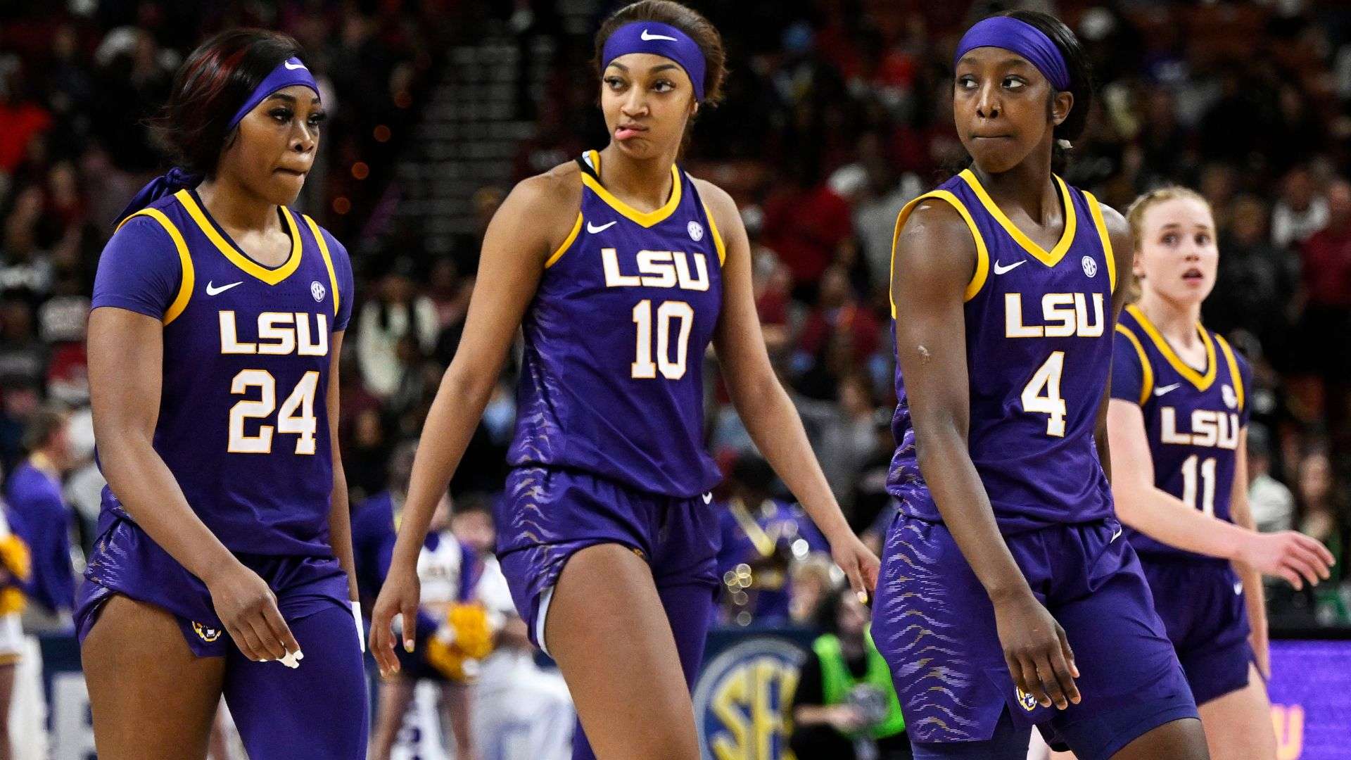 Aneesah Morrow #24, Angel Reese #10, Flau'jae Johnson #4, and Hailey Van Lith #11 of the LSU Lady Tigers