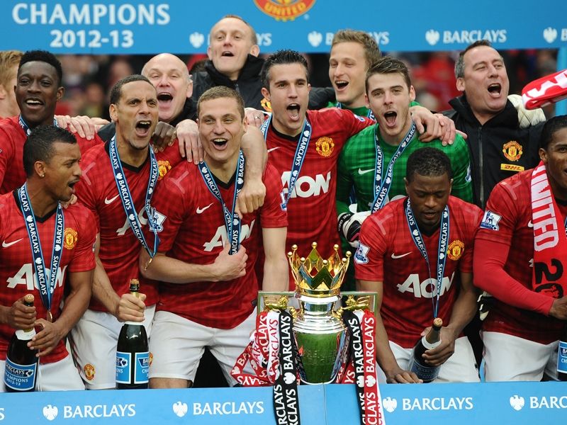 EPL - Manchester United v Swansea City, Manchester United players celebrate with the Premier League trophy