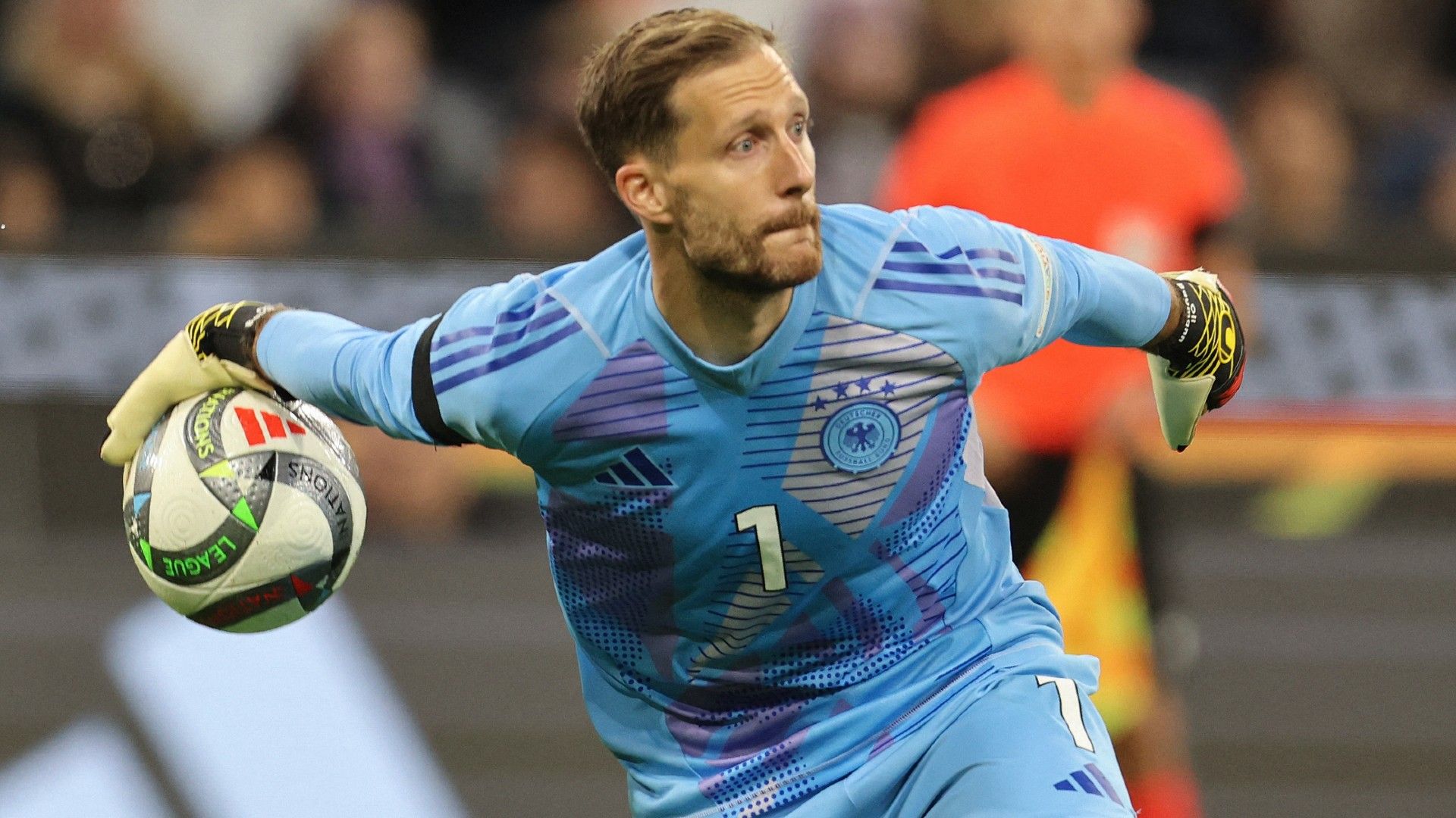 Germany's goalkeeper #01 Oliver Baumann throws out the ball 