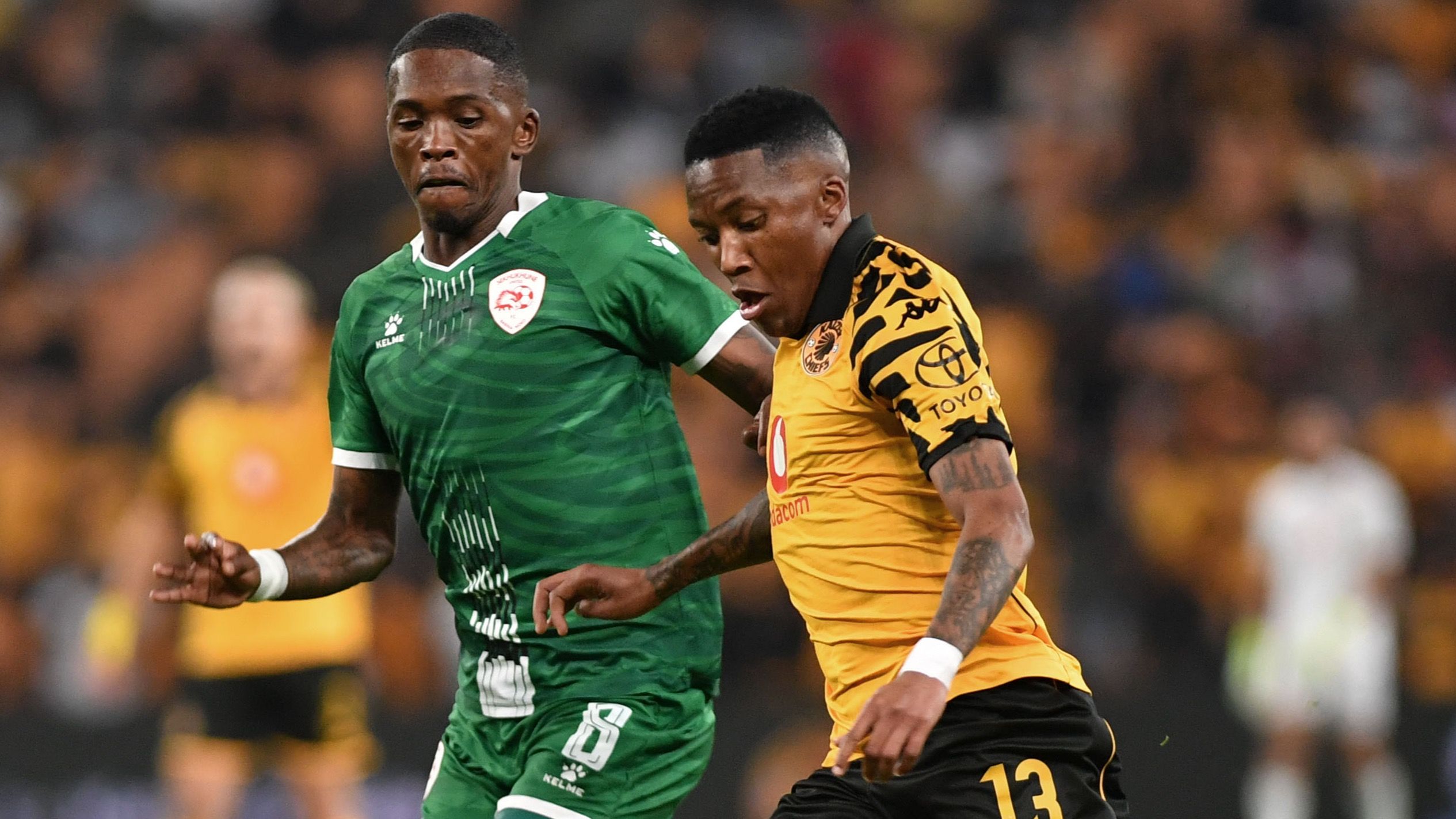 Pule Mmodi of Kaizer Chiefs and Thabang Monare of Sekhukhune United