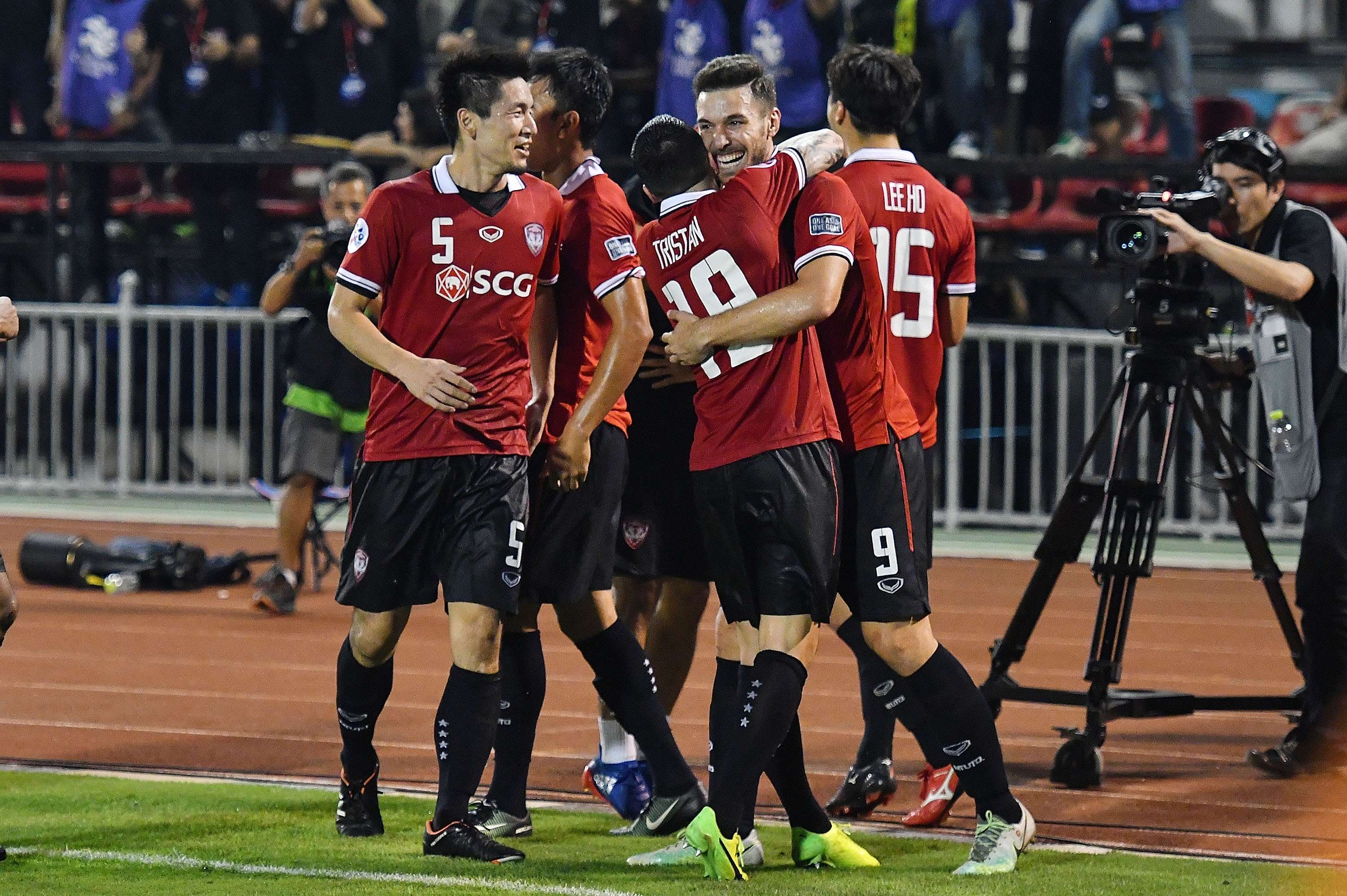 Xisco #9 of Muangthong United celebrates his goal with the team during the AFC Asian Champions League match