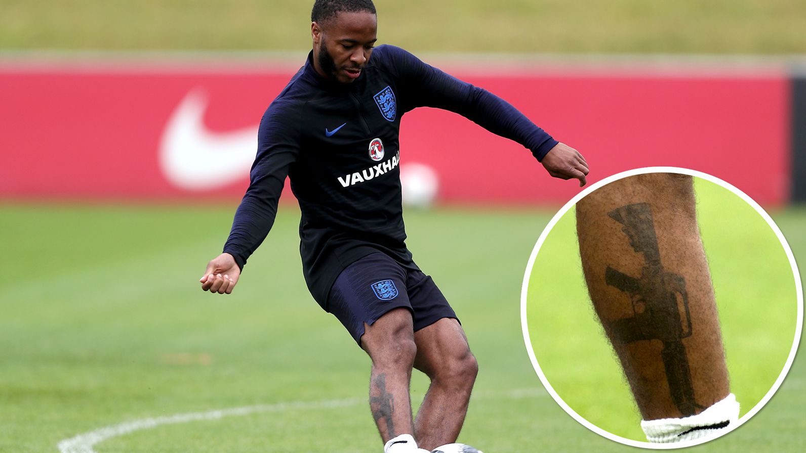 Raheem Sterling gun tattoo