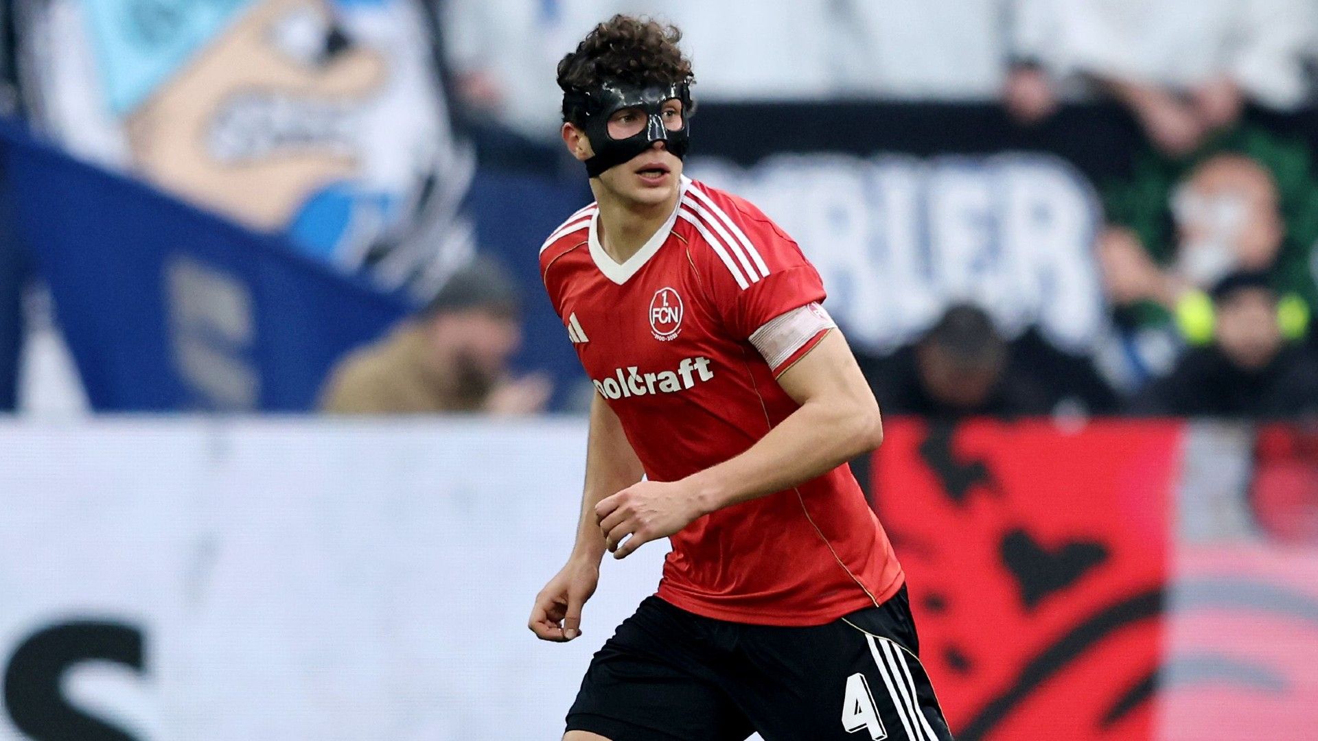 Fabio Gruber of 1. FC Nürnberg runs with the ball