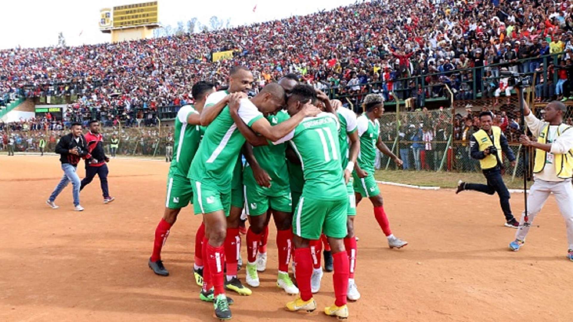 Madagascar players celebrate after scoring a goal against Senegal during their Africa Cup of Nations 2019 qualifier