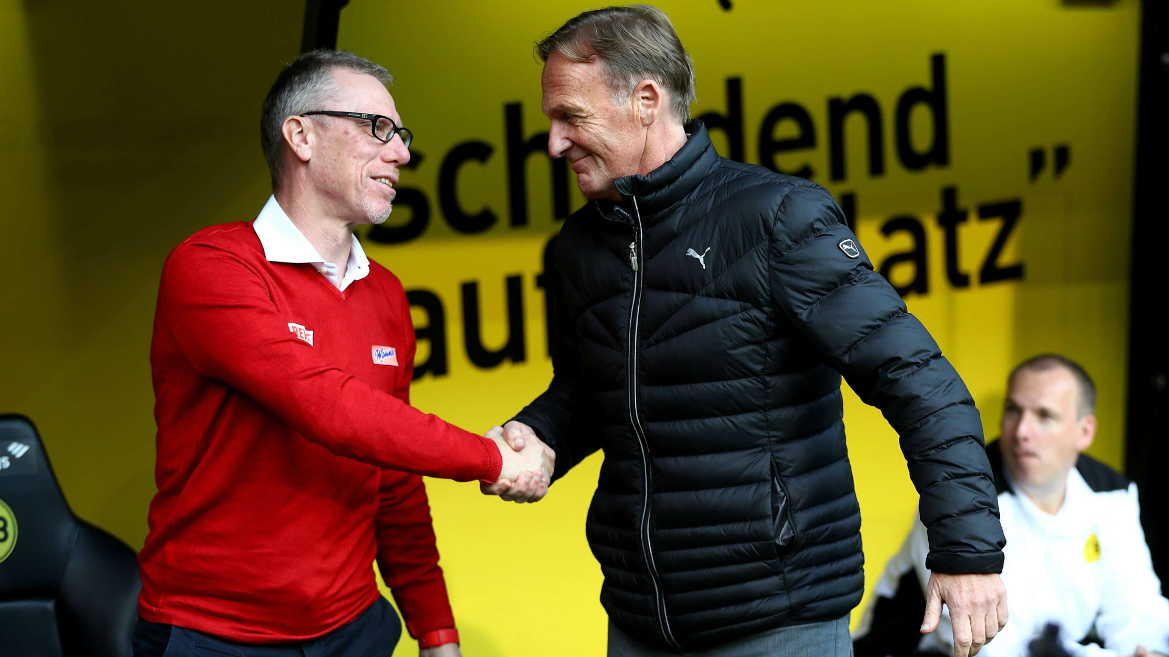 Peter Stoger Hans Joachim Watzke Borussia Dortmund