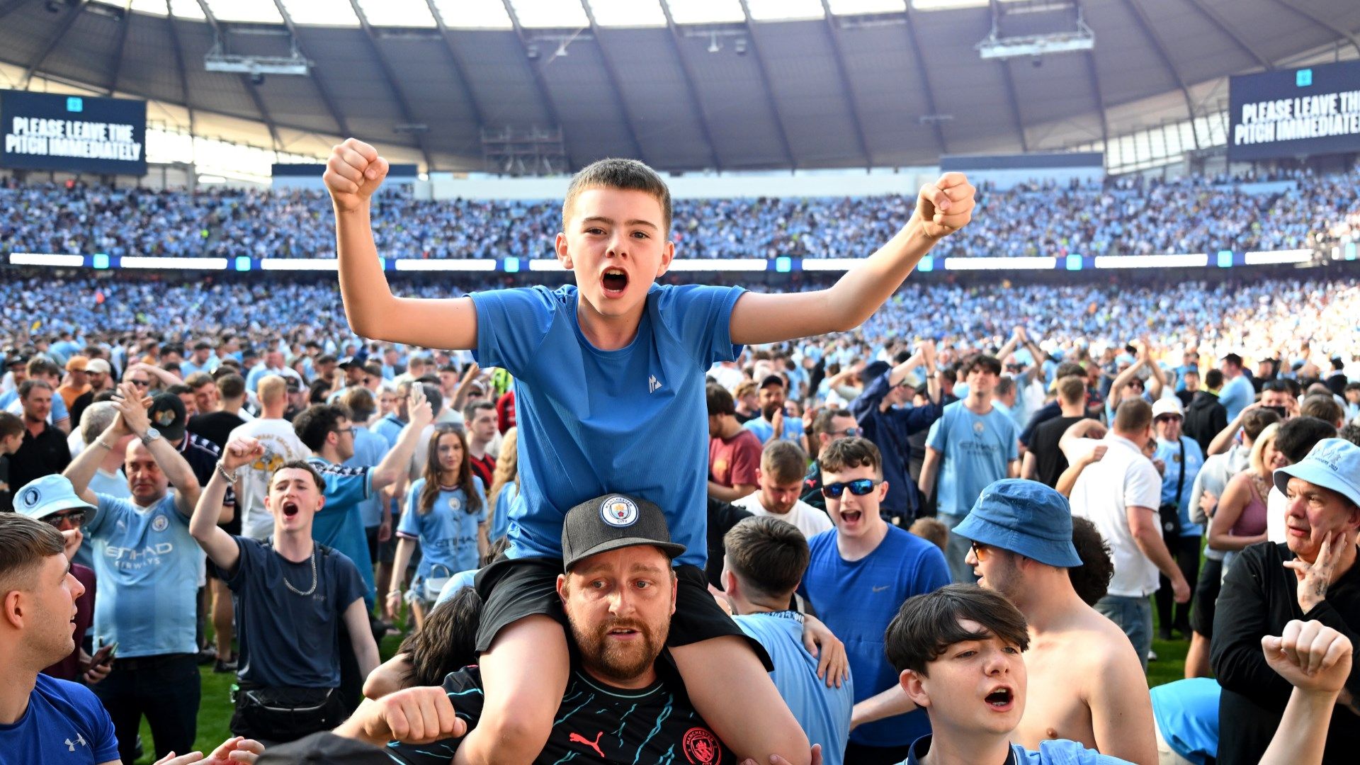 Man City pitch invasion