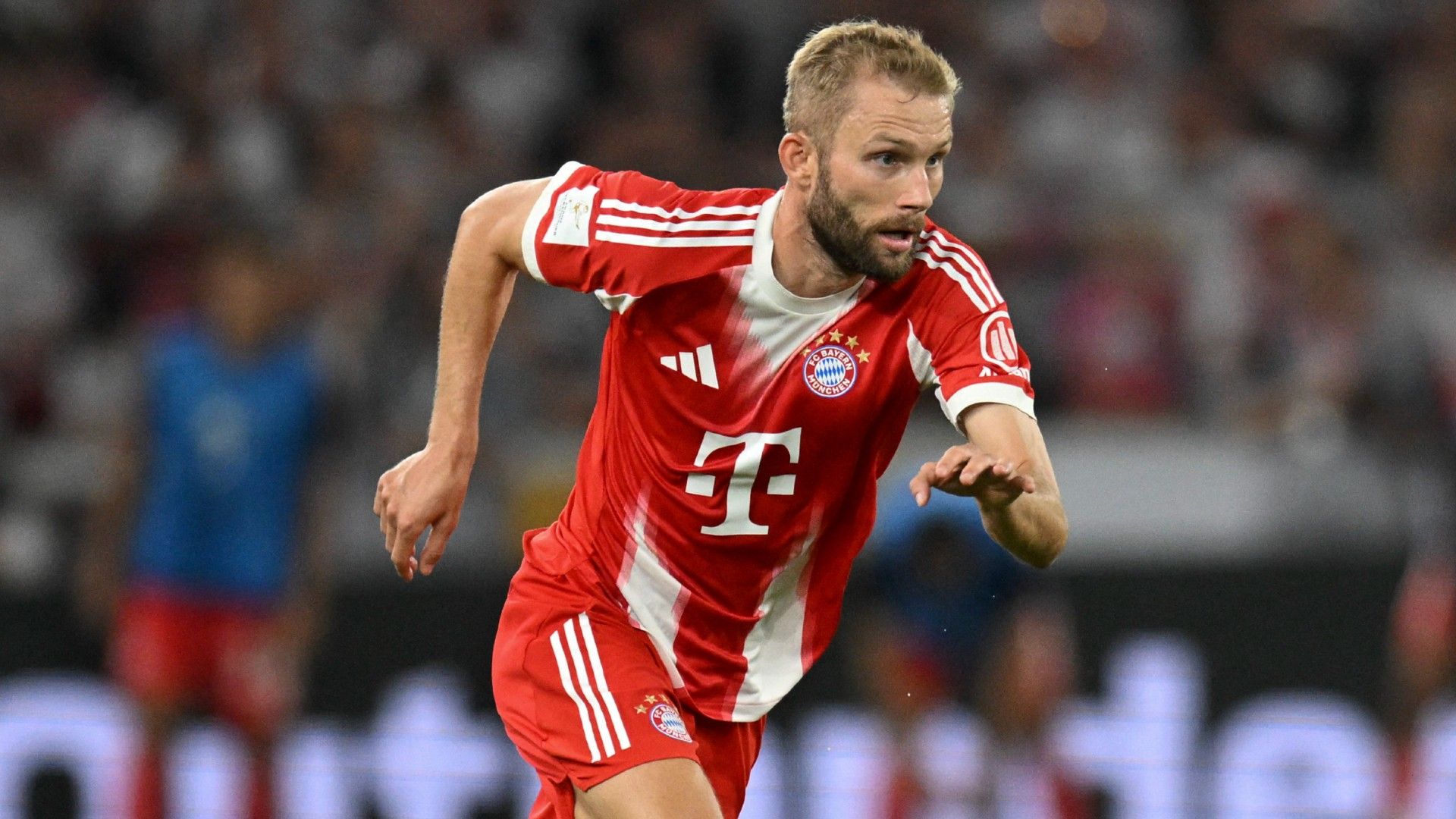 Bayern Munich's Austrian midfielder #27 Konrad Laimer runs for the ball 