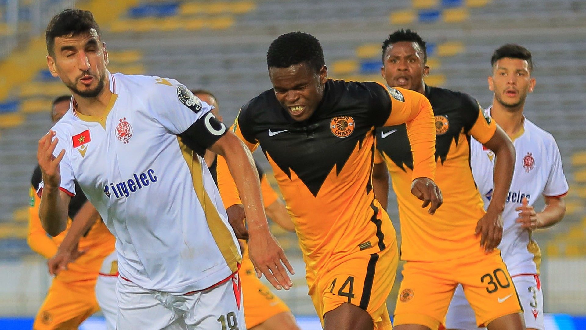 Walid El Karti of Wydad Casablanca challenged by Willard Katsande of Kaizer Chiefs, June 2021