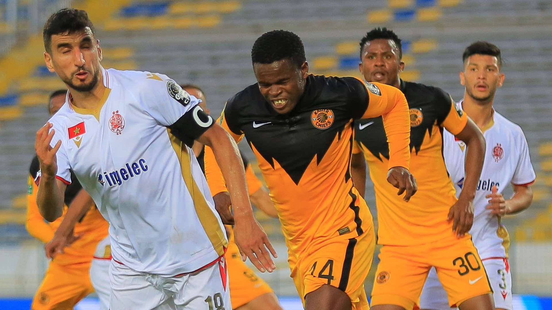 Walid El Karti of Wydad Casablanca challenged by Willard Katsande of Kaizer Chiefs, June 2021