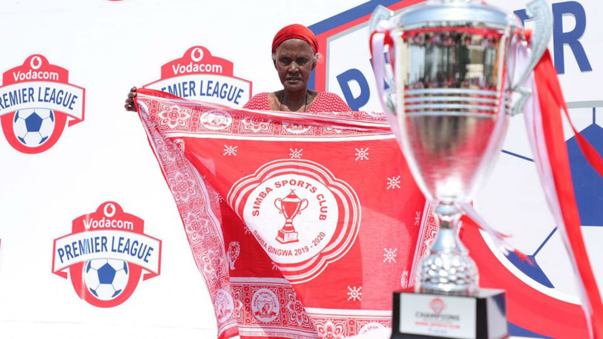 Simba SC with trophy.