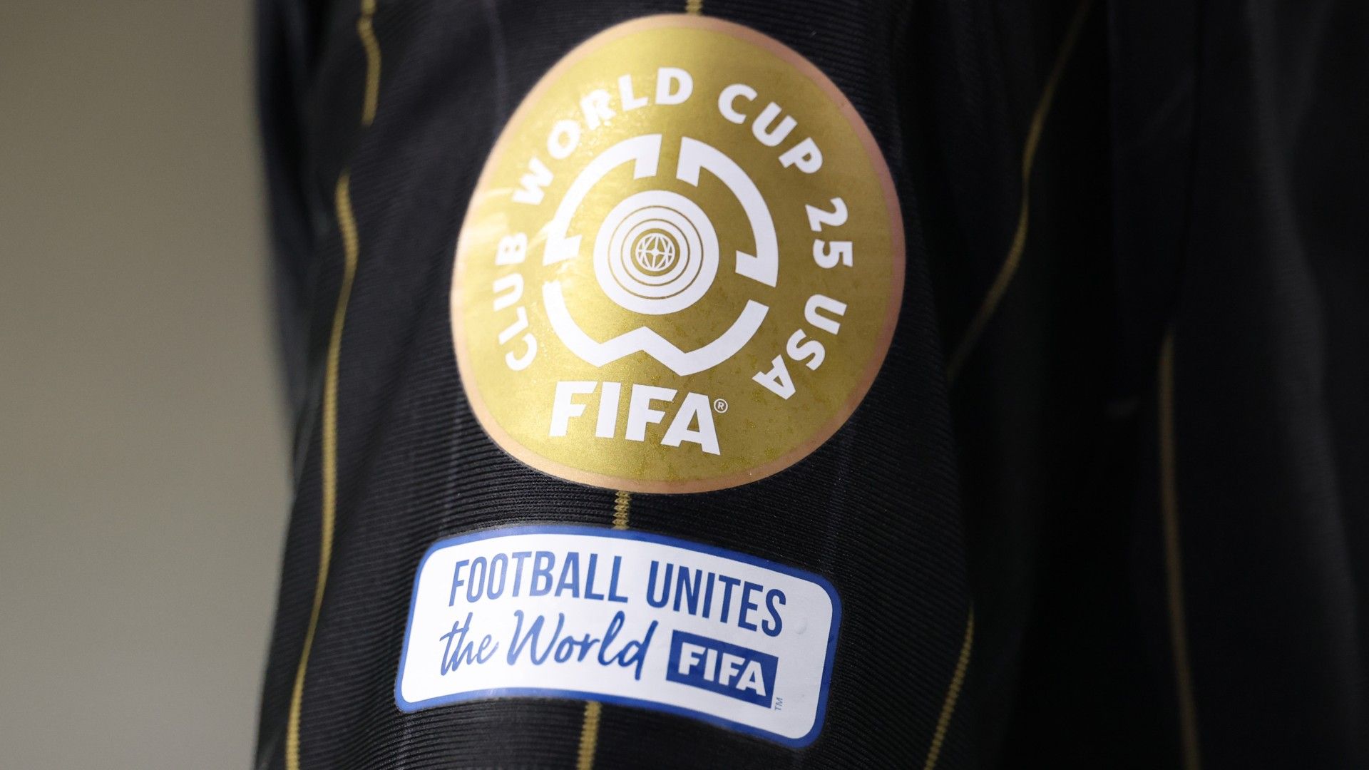 Detail of the FIFA Club World Cup 2025 and Football Unites the World badges 